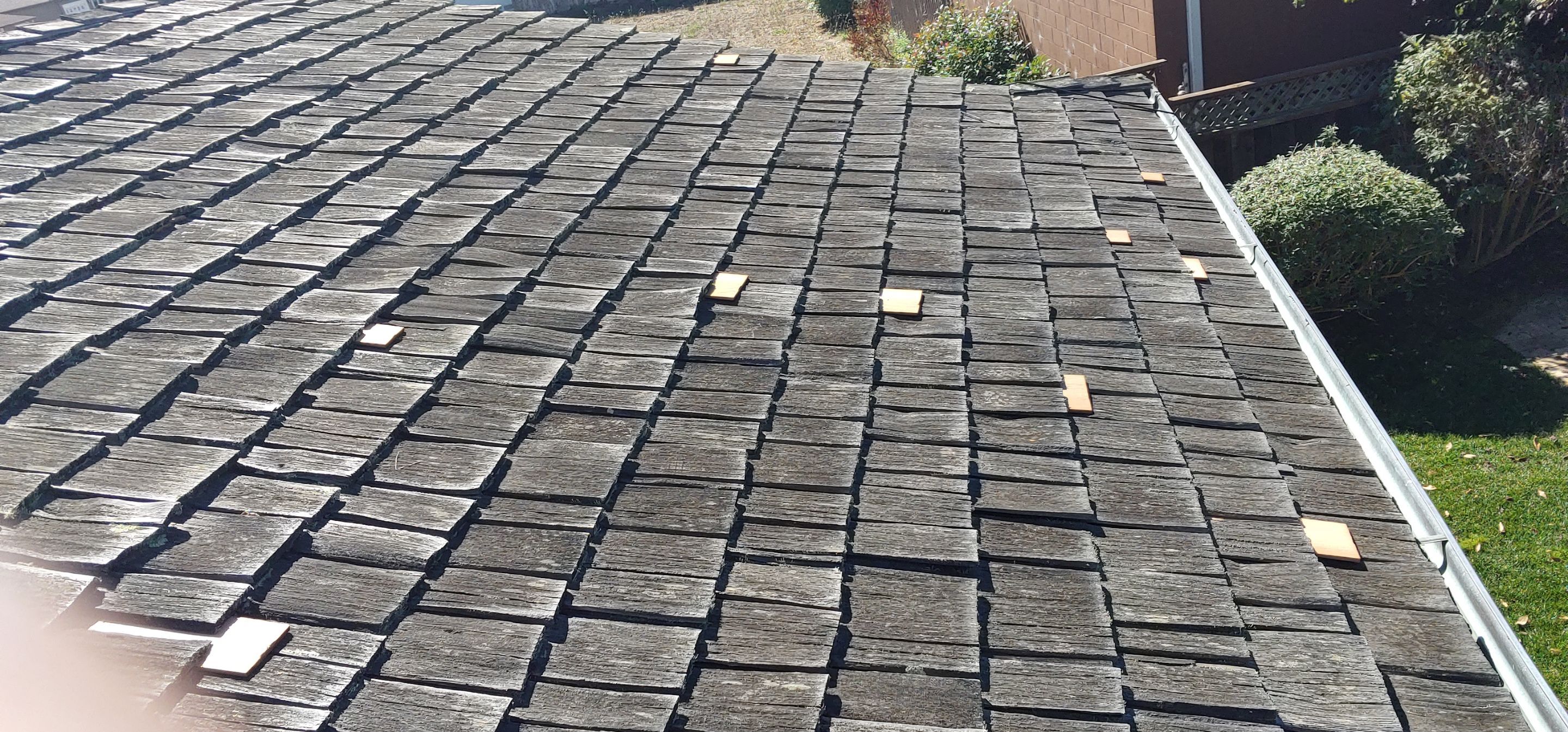 Refurbish and repair shake roof to get ready to sell by Straight Edge Roofing Inc