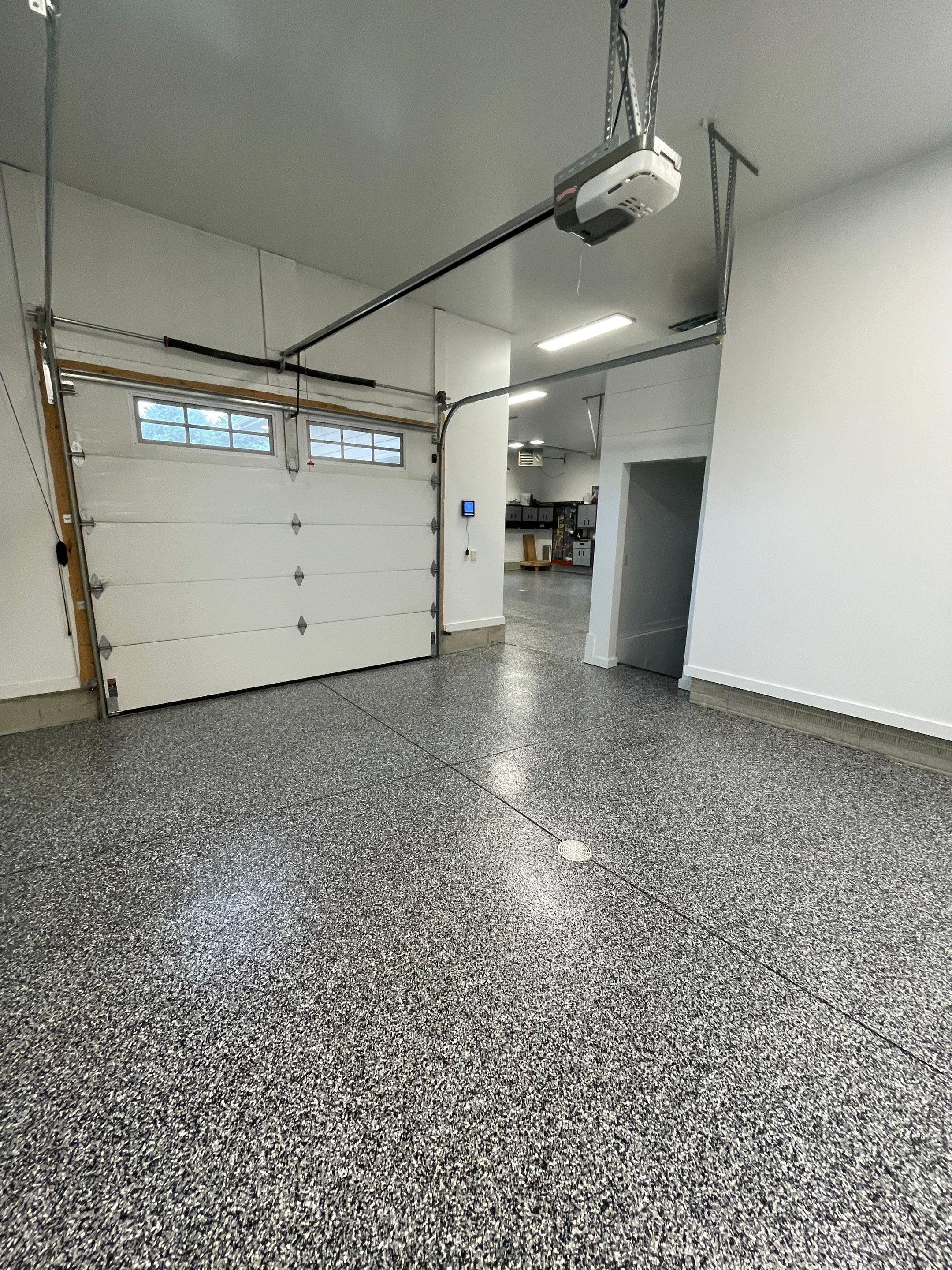 Garage Floor Coating and Domino Flake Finish in Sioux Falls by Select Painting, Coatings & Garage Cabinets