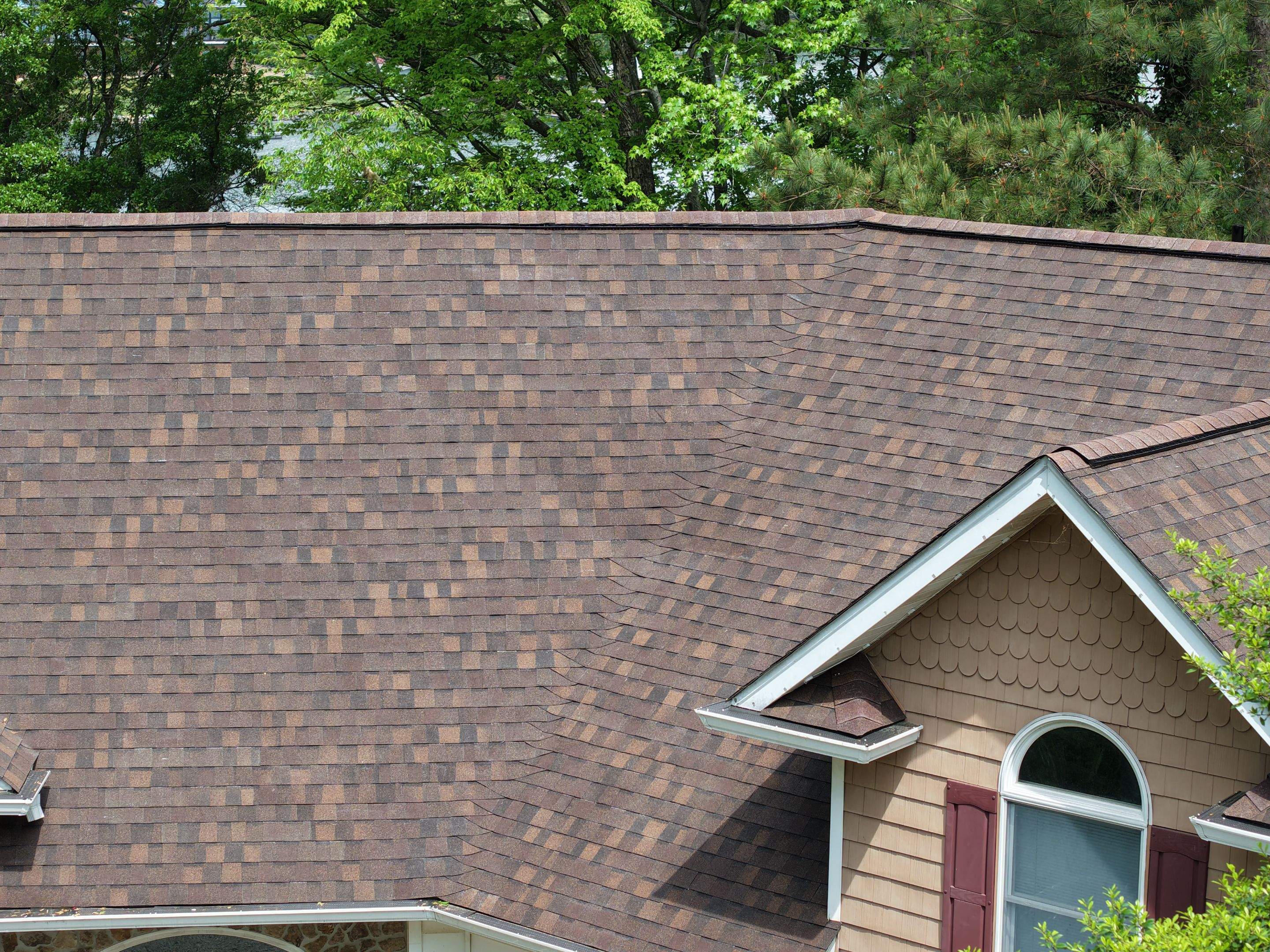 Residential Roofing Installation using  TAMKO Titan XT Rustic Redwood by RISE Roofing & Restoration, LLC