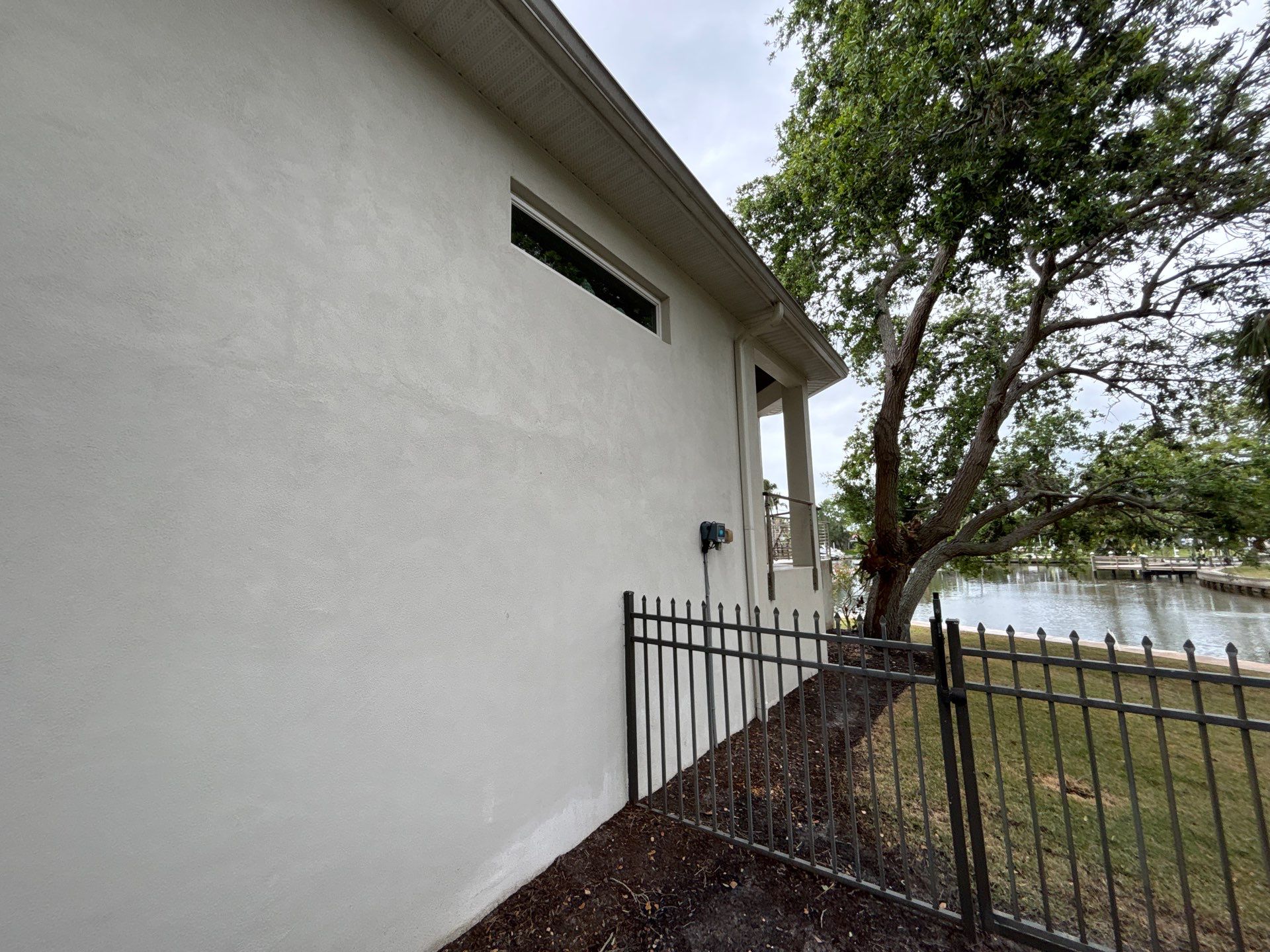 6-Inch White Seamless Gutters Installation in Siesta Key FL by Gutter Professors