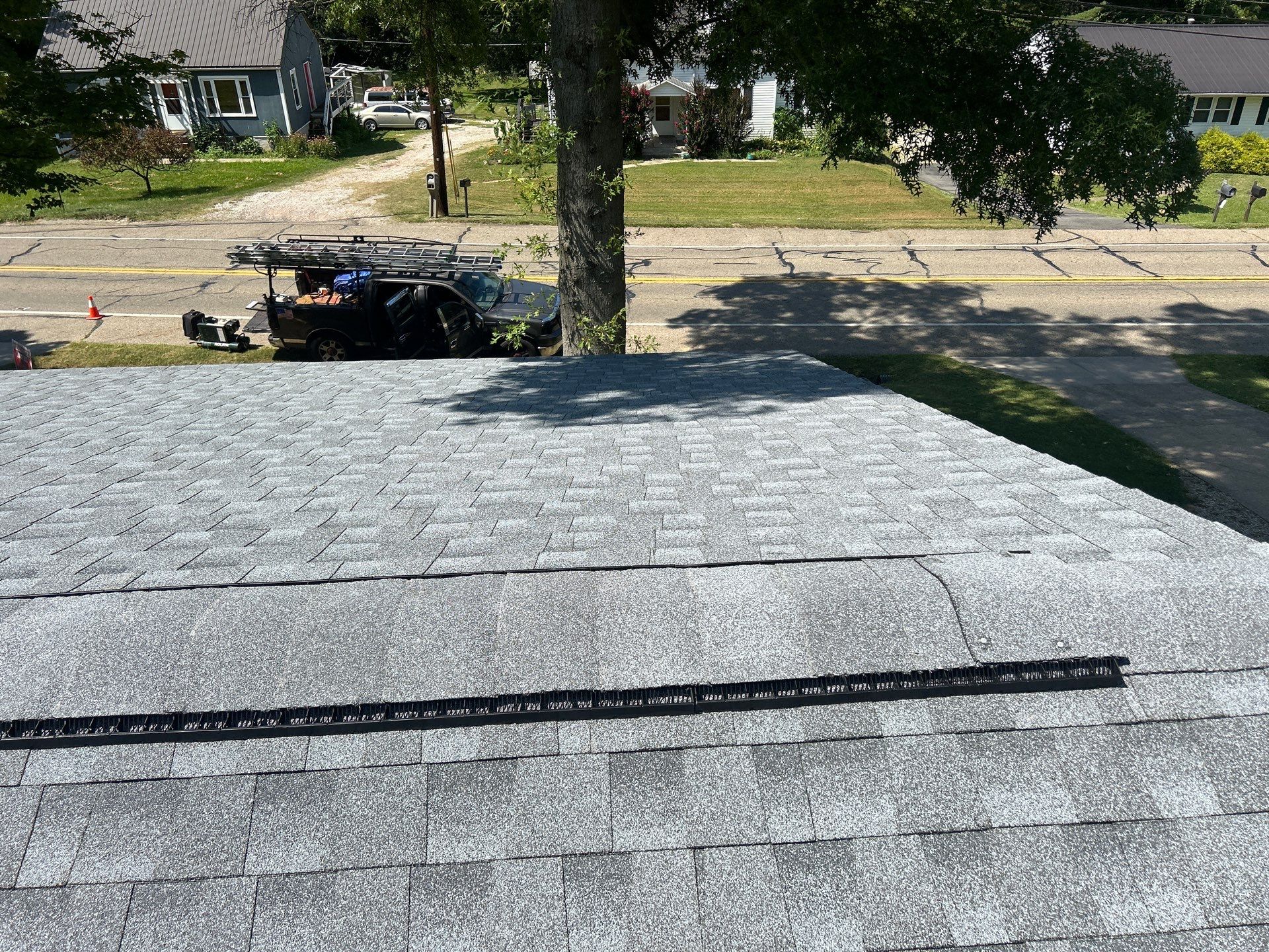 Residential Roofing Installation using GAF Timberline HDZ Oyster Grey by Rainstoppers Roofing