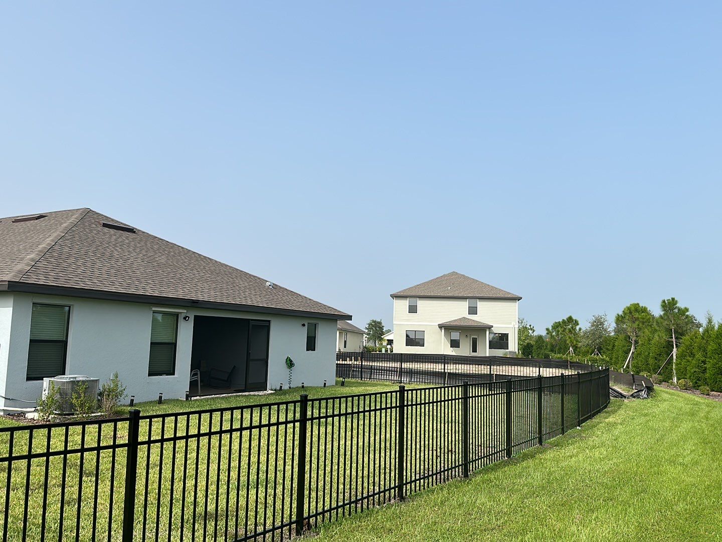 Aluminum Fence Installation using Black 3 Rail Aluminum Fence by Asap fence and gates, LLC