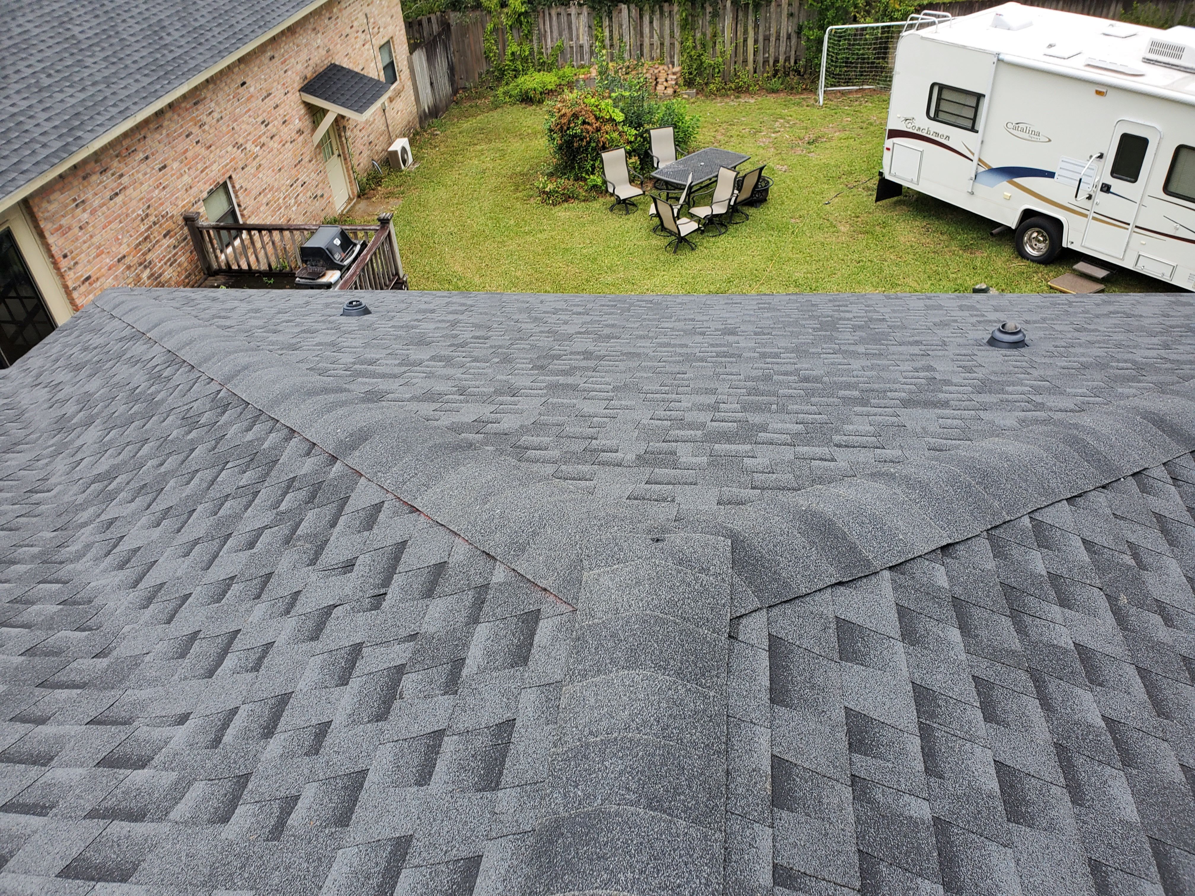 Residential Roofing Installation using Roof Replacement by American Roofing & Construction LLC