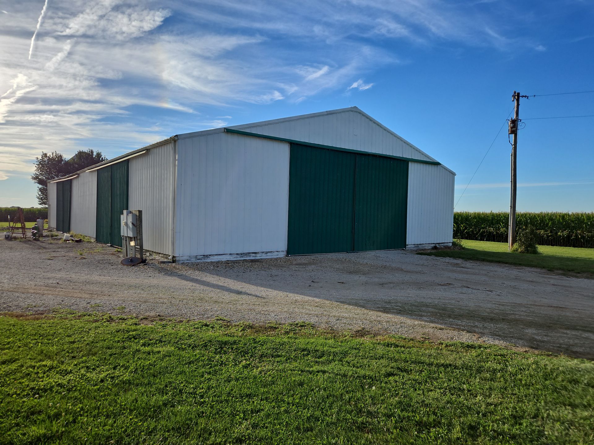 Reskin pole barn and add lean-to by Dagny Builders