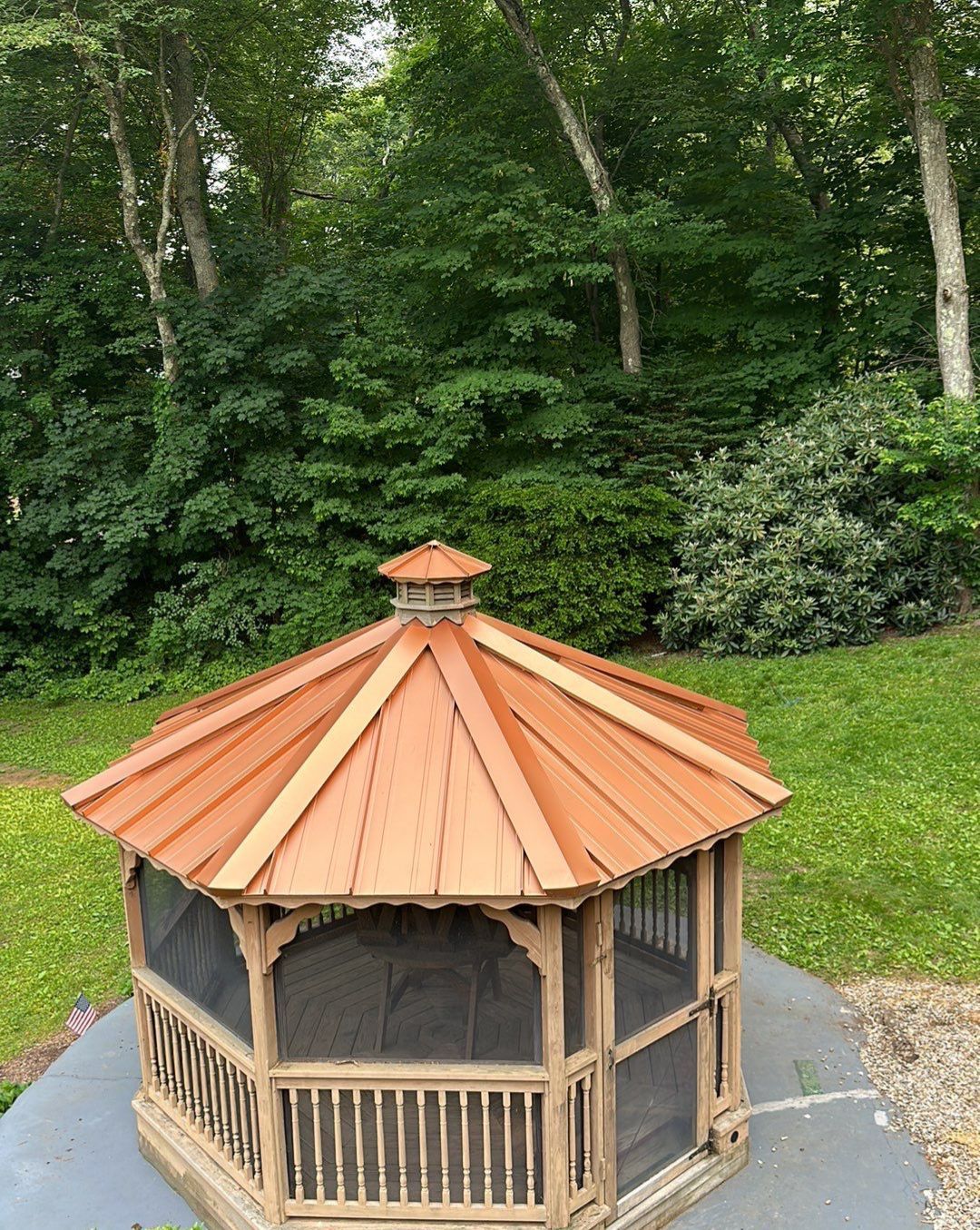 Residential Roofing Installation using Copper Penny Metal Roof by A Plus Exterior