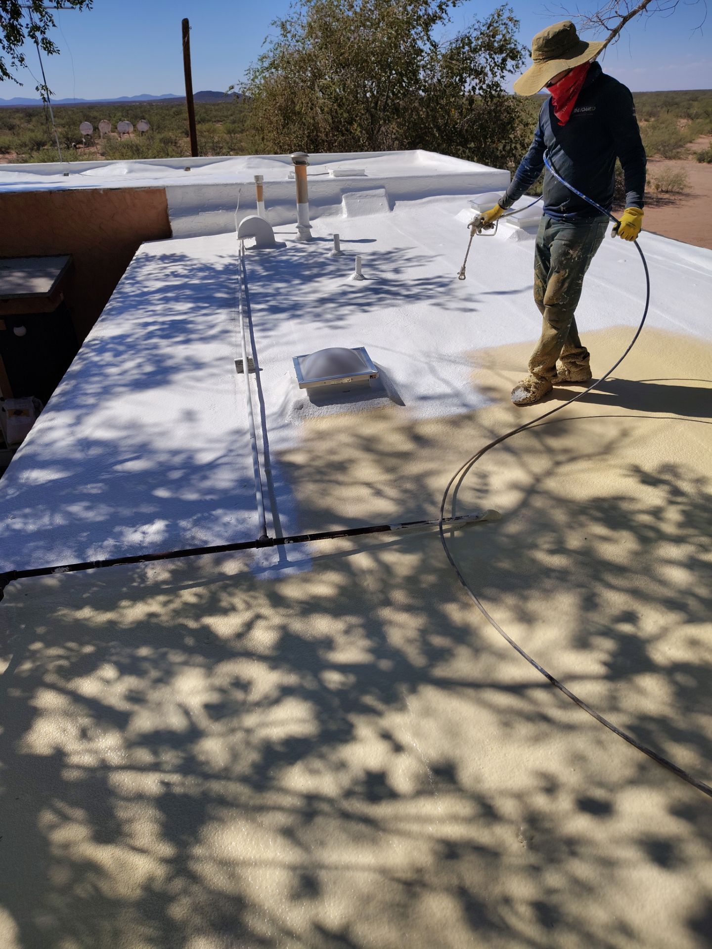 Residential roof application by SPF Services 