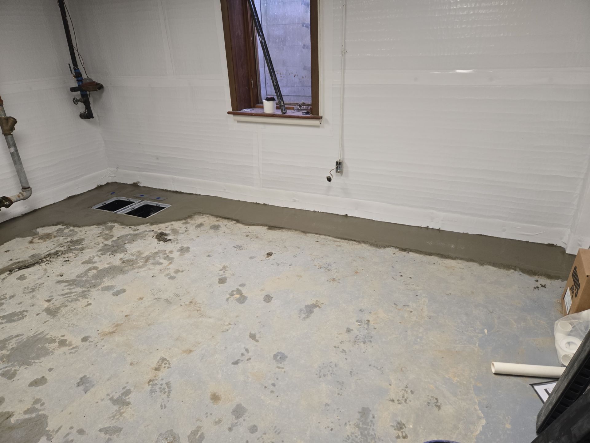 Interior Basement Waterproofing System with Embedded Fiber Reinforcement by Toledo Basement Repair 