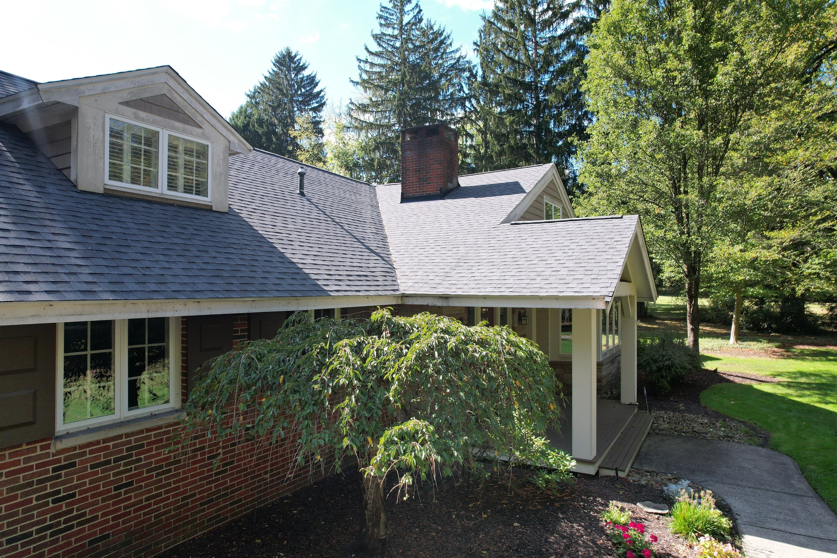 Moreland Hills Roof + Gutters Replacement by Atlas Roofing & Restoration