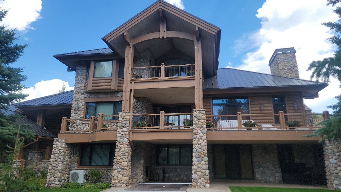 Standing Seam Metal Roof Replacement After Snow Damage by ASAP Roofing & Restoration