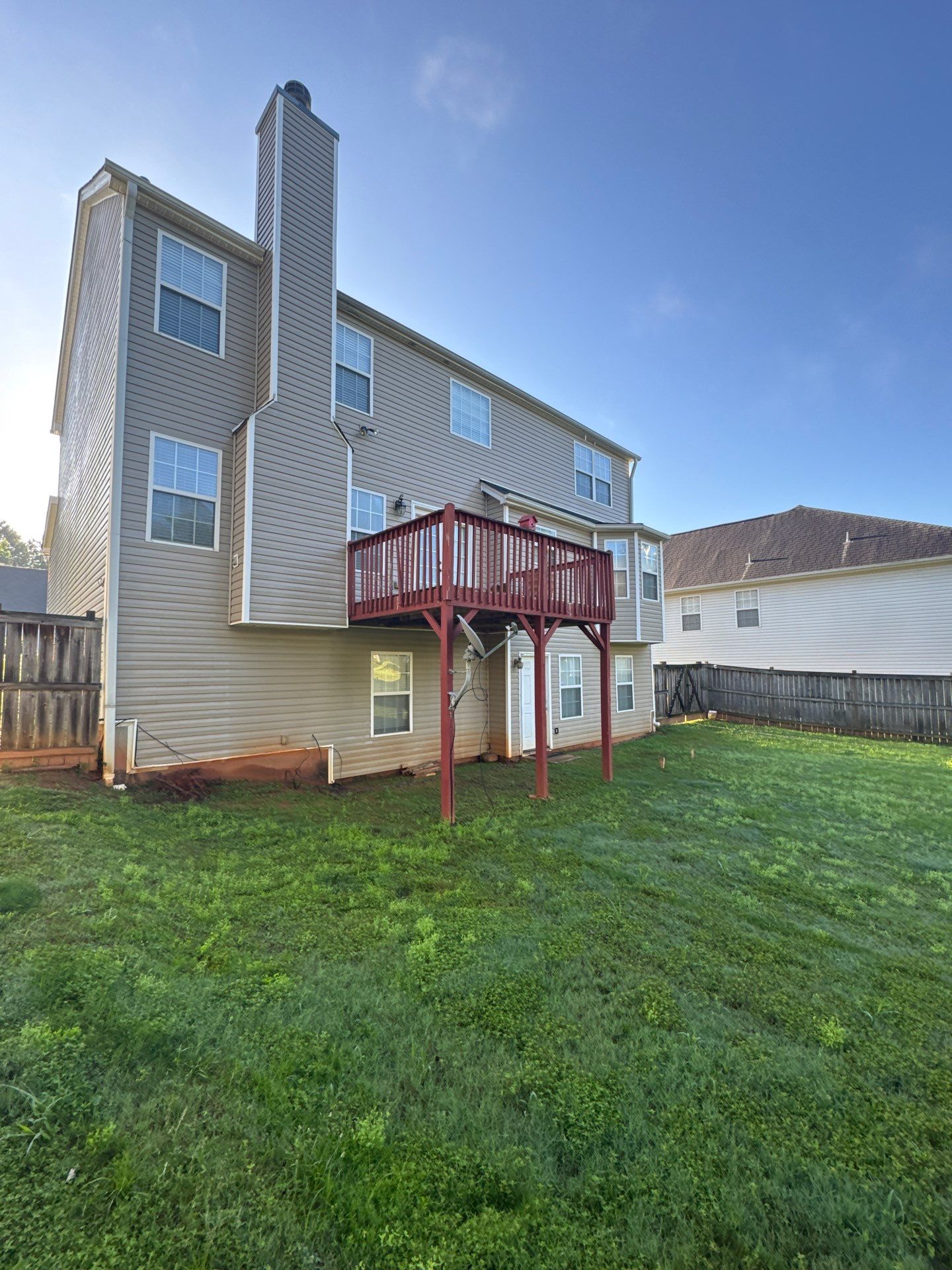 Backyard Deck Expansion & Custom Staircase Installation in Suwanee. by Swift Home Renovations