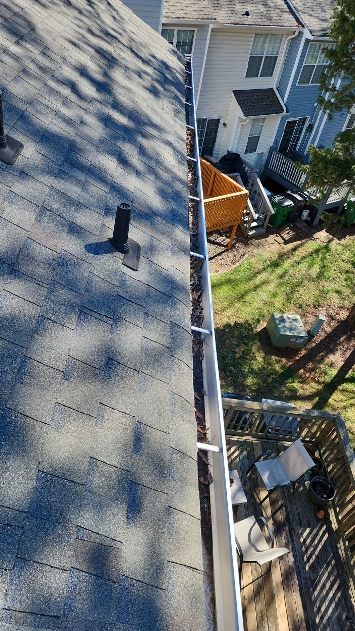 Gutter Cleaning using water by Power Wash Masters LLC