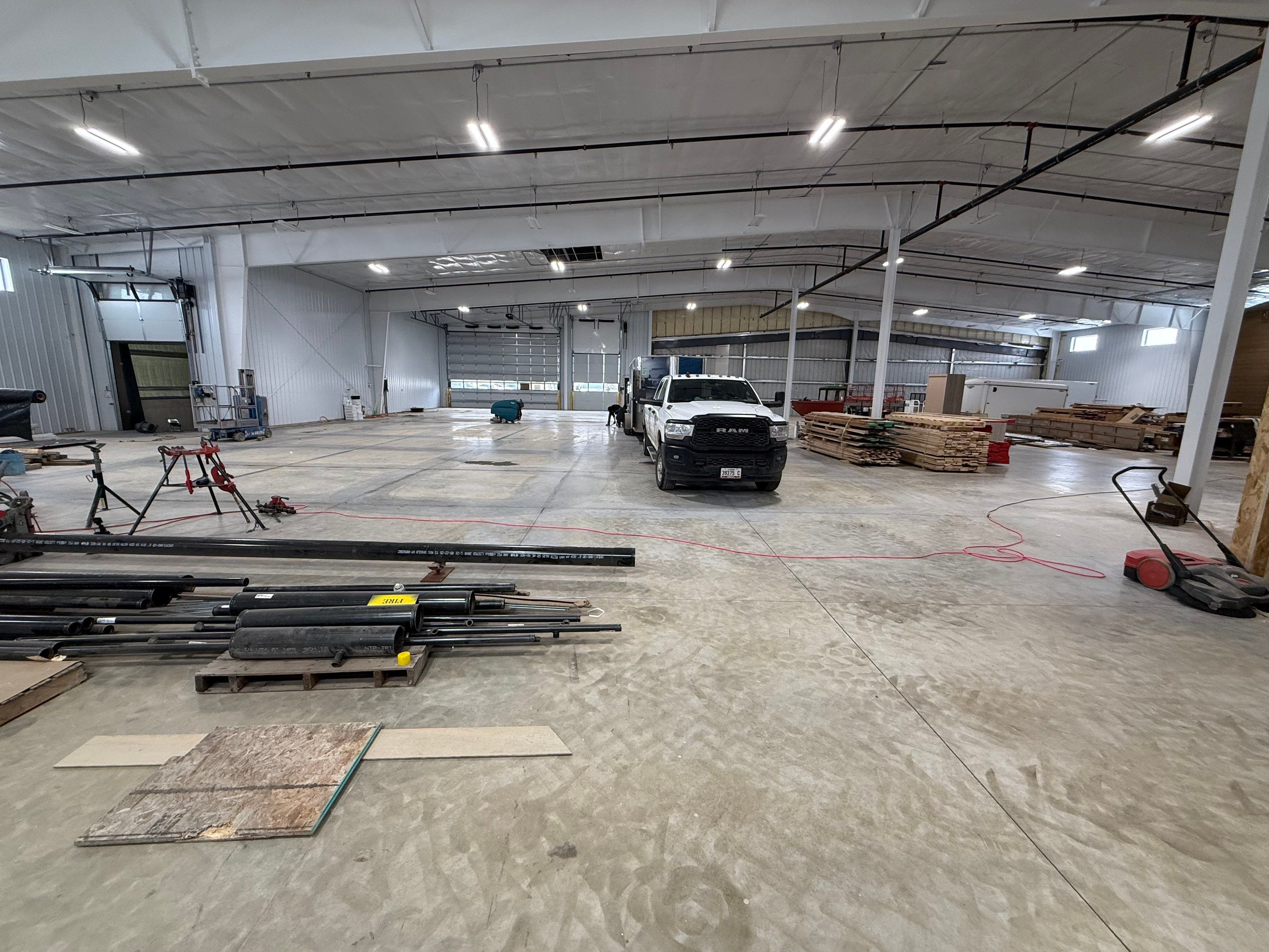 Industrial Concrete Polishing and Coating for Large Manufacturing Warehouse by Select Painting, Coatings & Garage Cabinets