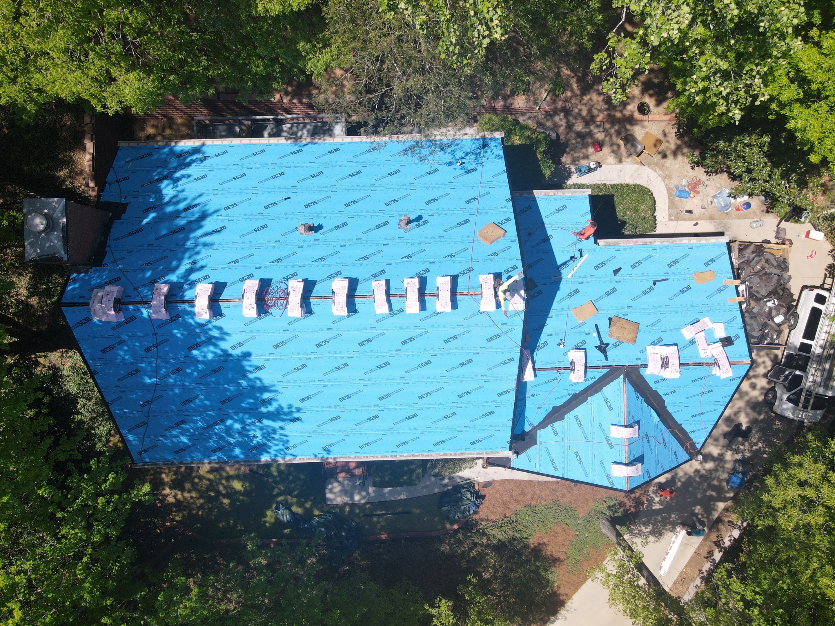 Residential Roofing Installation using Owens Corning Quary Gray by Inspector Roofing and Restoration