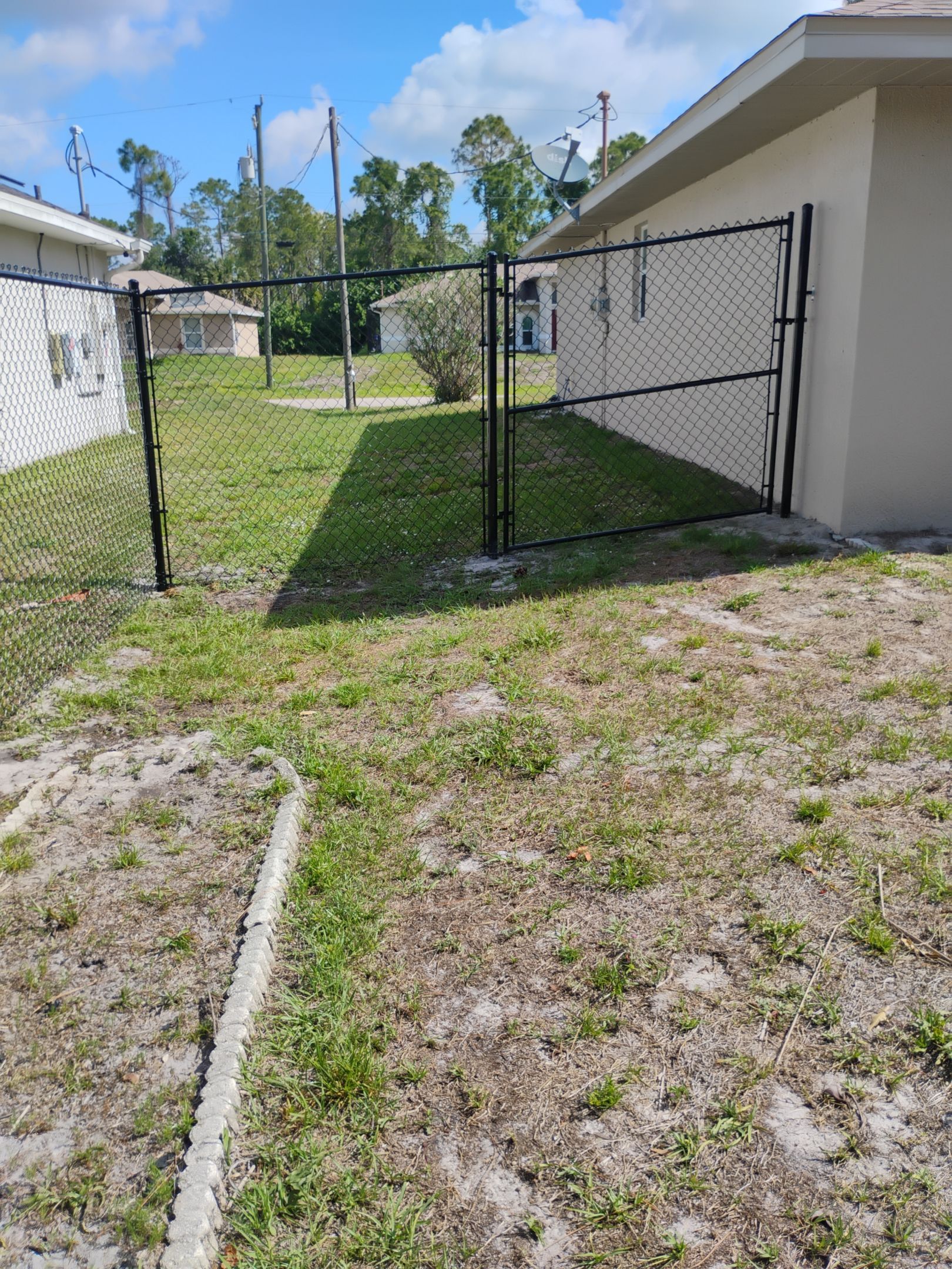 Black Chain Link Fence in North Port by True Fence LLC