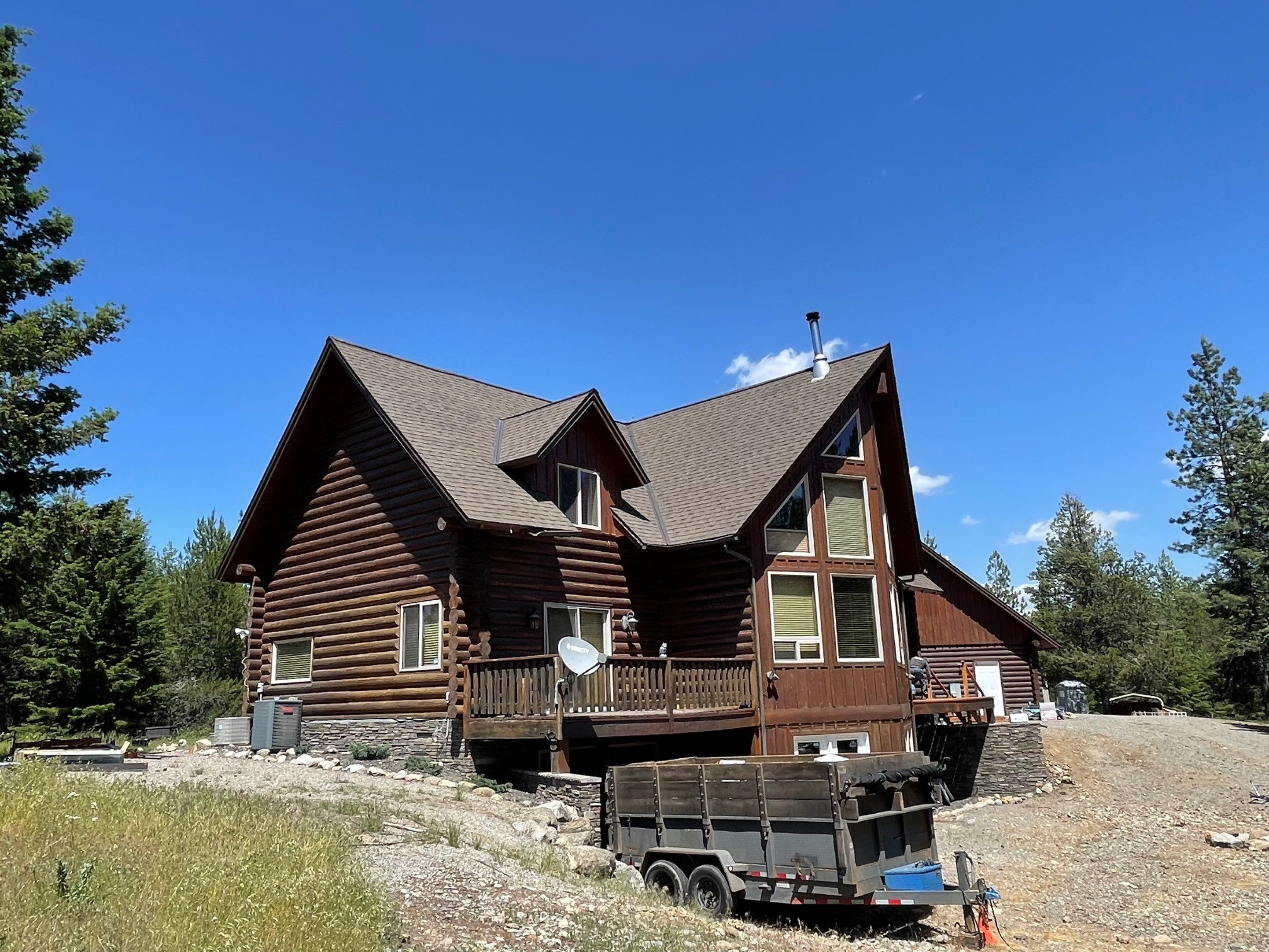 Architectural Shingle Roof Installation for Spirit Lake Log Home Coeur D'Alene Drive Spirit Lake, Idaho, 83869 (SECTION A) PARTIAL ROOF REPLACEMENT - CertainTeed 50 Year Material Guarantee - CertainTeed Workmanship Guarantee: 30 Years - CertainTeed Warranty Transfer Period: 20 Years - Certainteed Landmark® Shingle - Heather Blend by Alpine Roofing