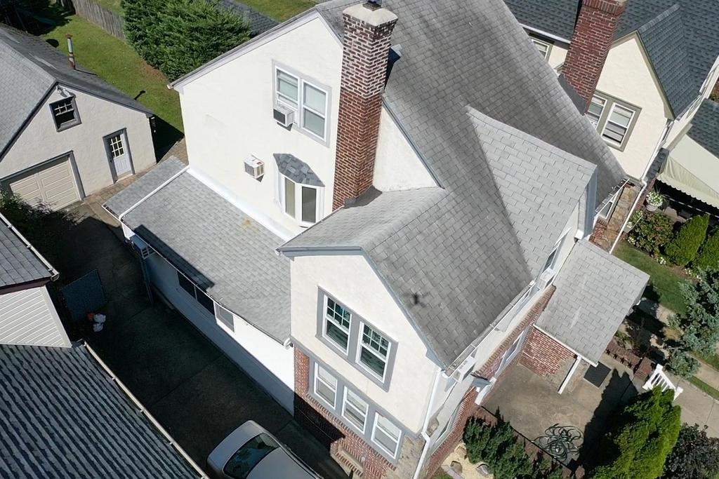 New Roof & Gutters by Island Roofing Inc.