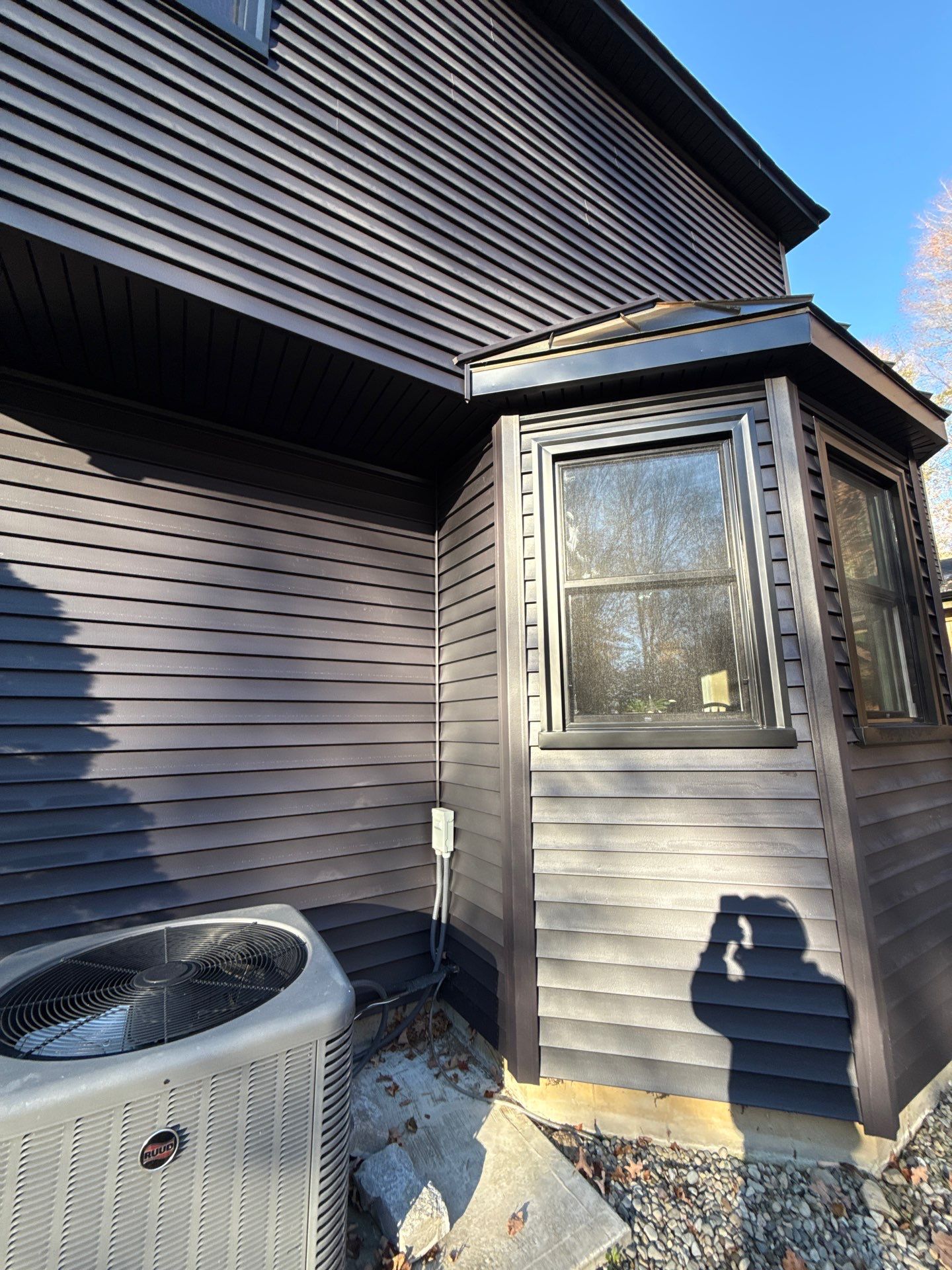 Bold Siding transformation with Cert Cedar Board & Batten S12, White, and Cert Monogram D/4 x 12'6" clapboard, Tuxedo by DiGiorgi Roofing and Siding Inc