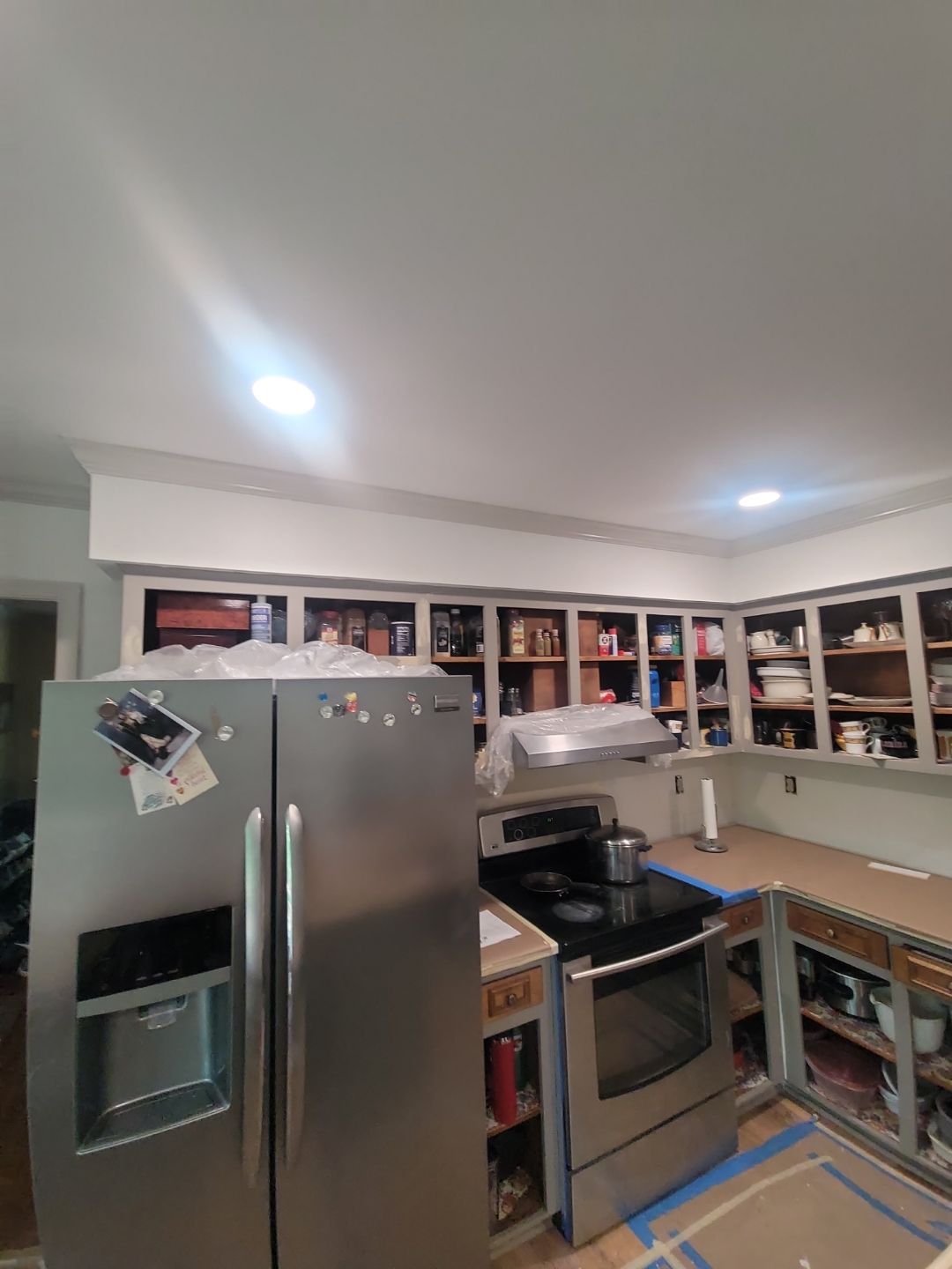 A Pathway to Personality – A Two-Tone Kitchen Transformation in Apex by Elite Remodeling and Design LLC