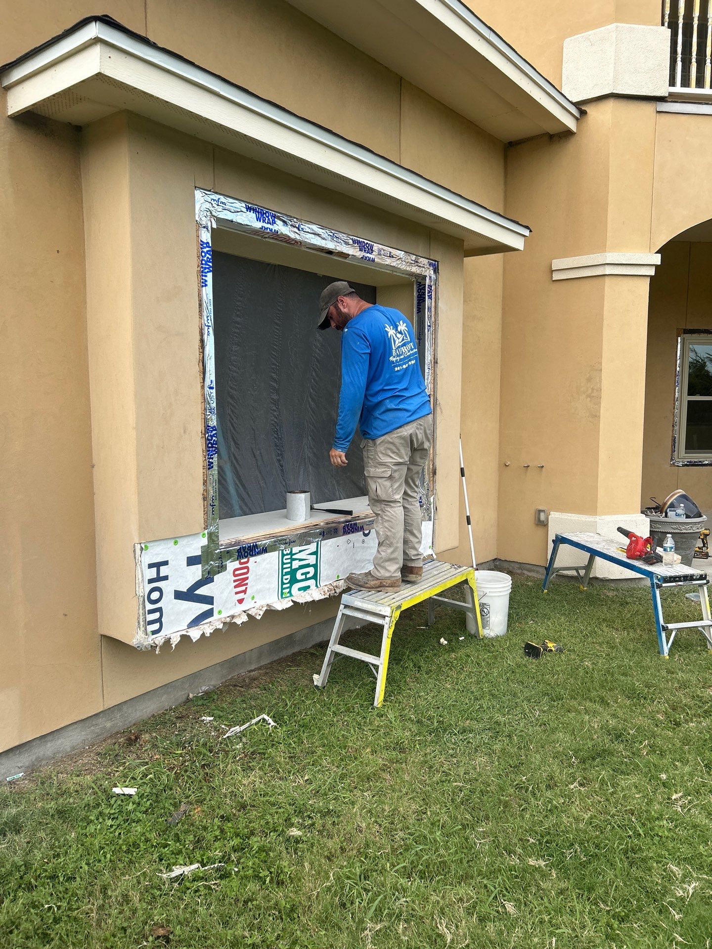Installing Windows on a Submarine  by Bayfront Roofing and Construction