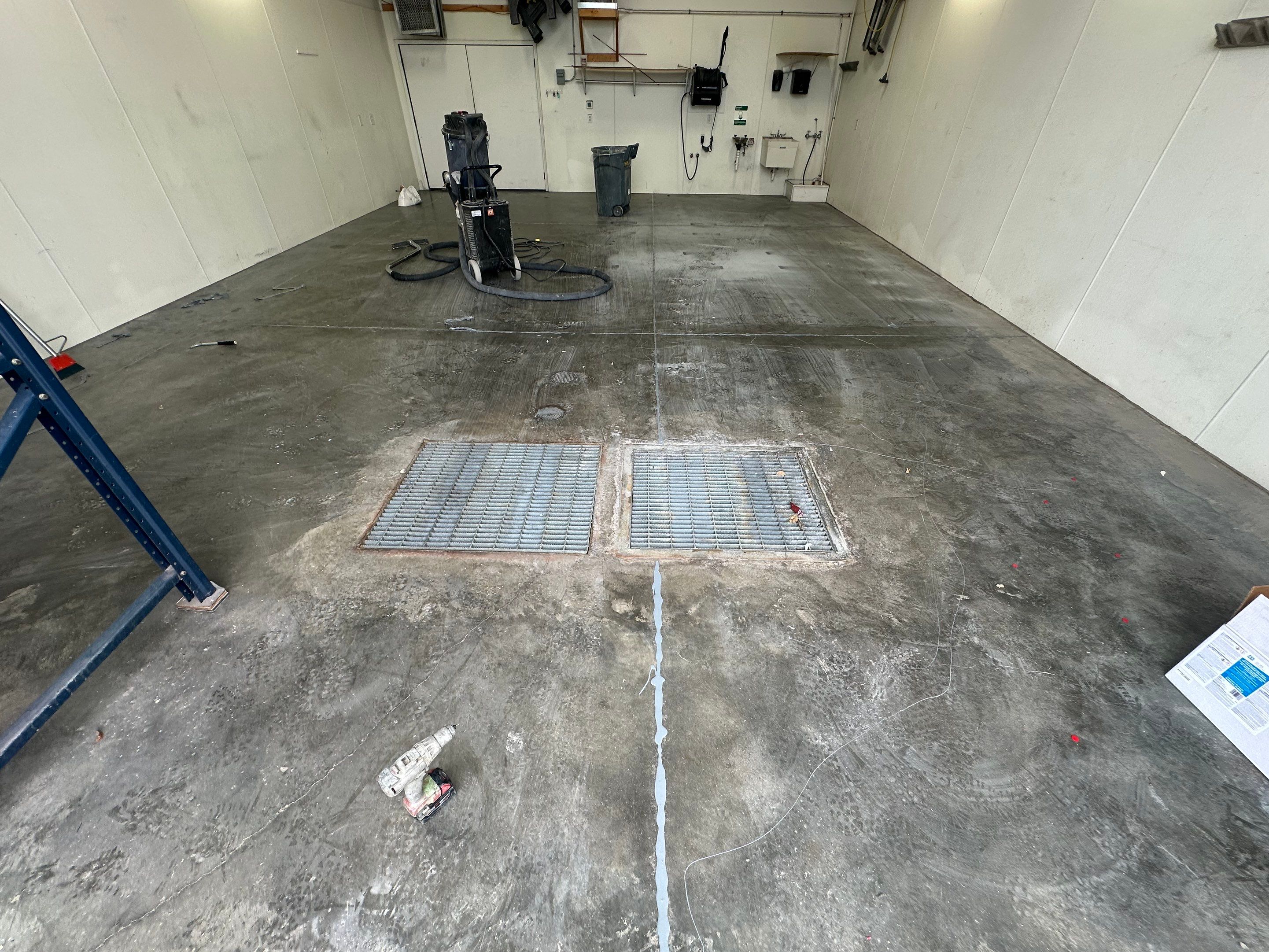 Commercial Grey Speckled Epoxy Floor Coating for Industrial Workshop by Select Painting, Coatings & Garage Cabinets