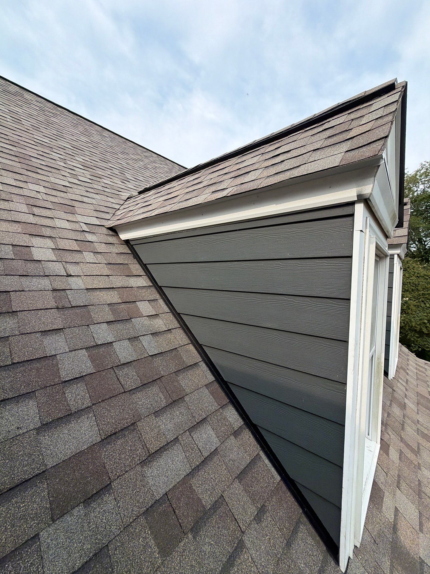 Roof Replacement and White Gutter Installation in Gloucester by Cade Construction