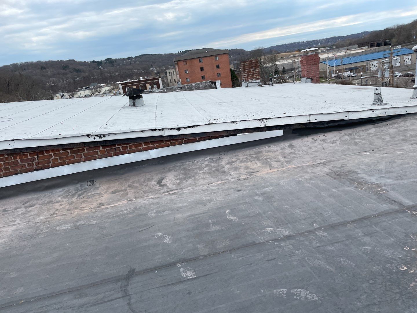Commercial Roofing Installation using EPDM  by A Plus Exterior