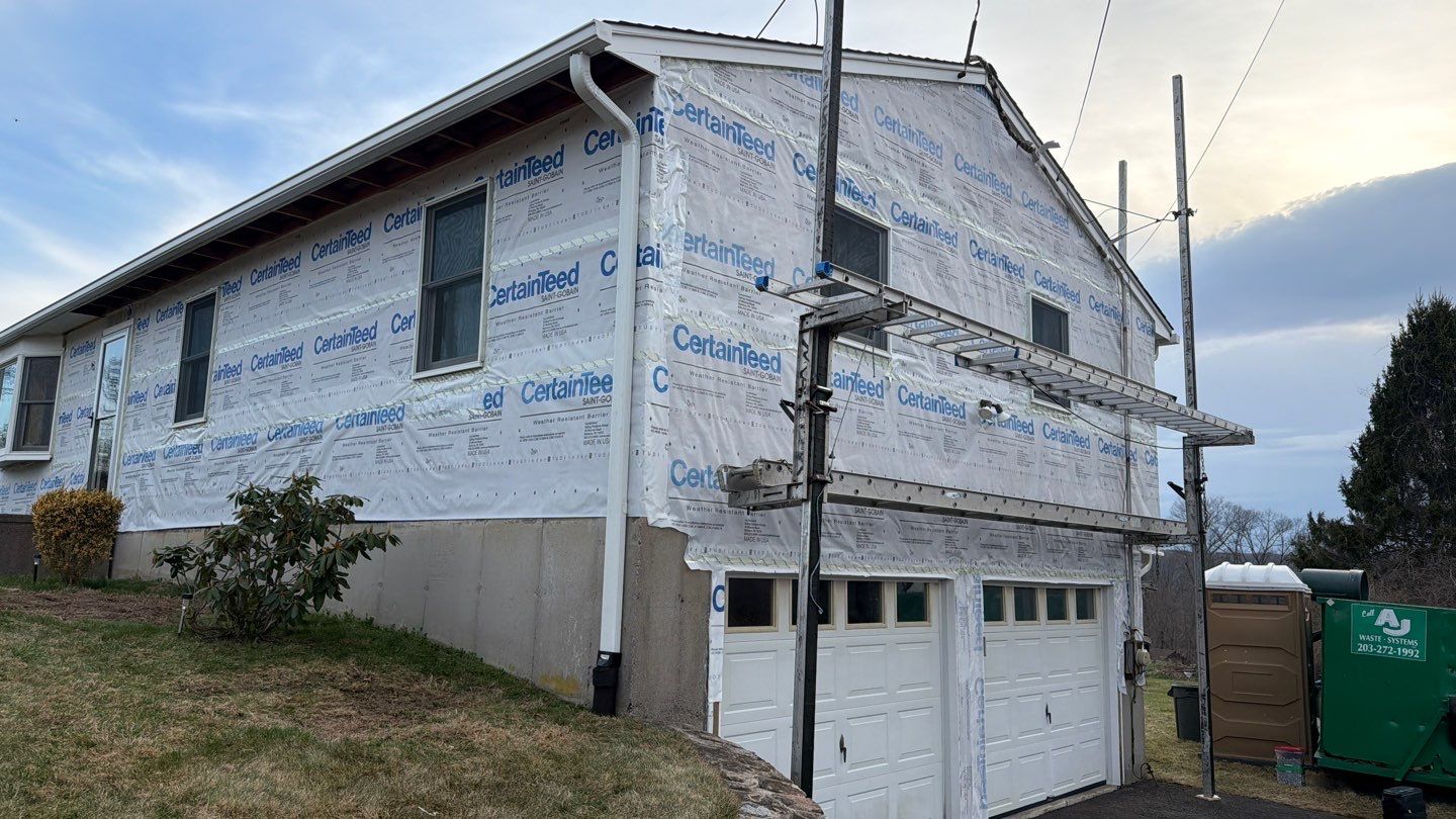 Siding refresh with Cert Monogram D/4 x 12'6" clapboard, Cypress by DiGiorgi Roofing and Siding Inc