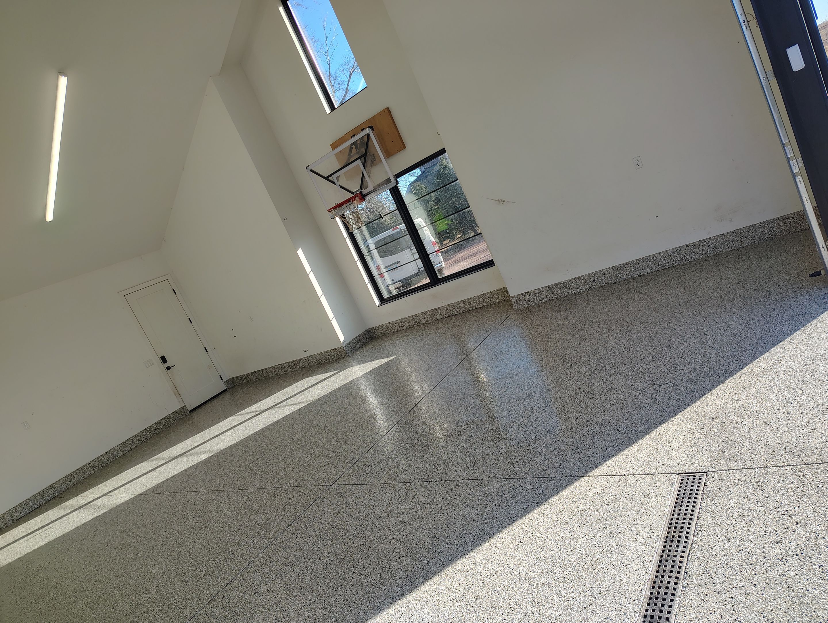Epoxy Flake Garage Floor and Stair Coating in Sioux Falls by Select Painting, Coatings & Garage Cabinets