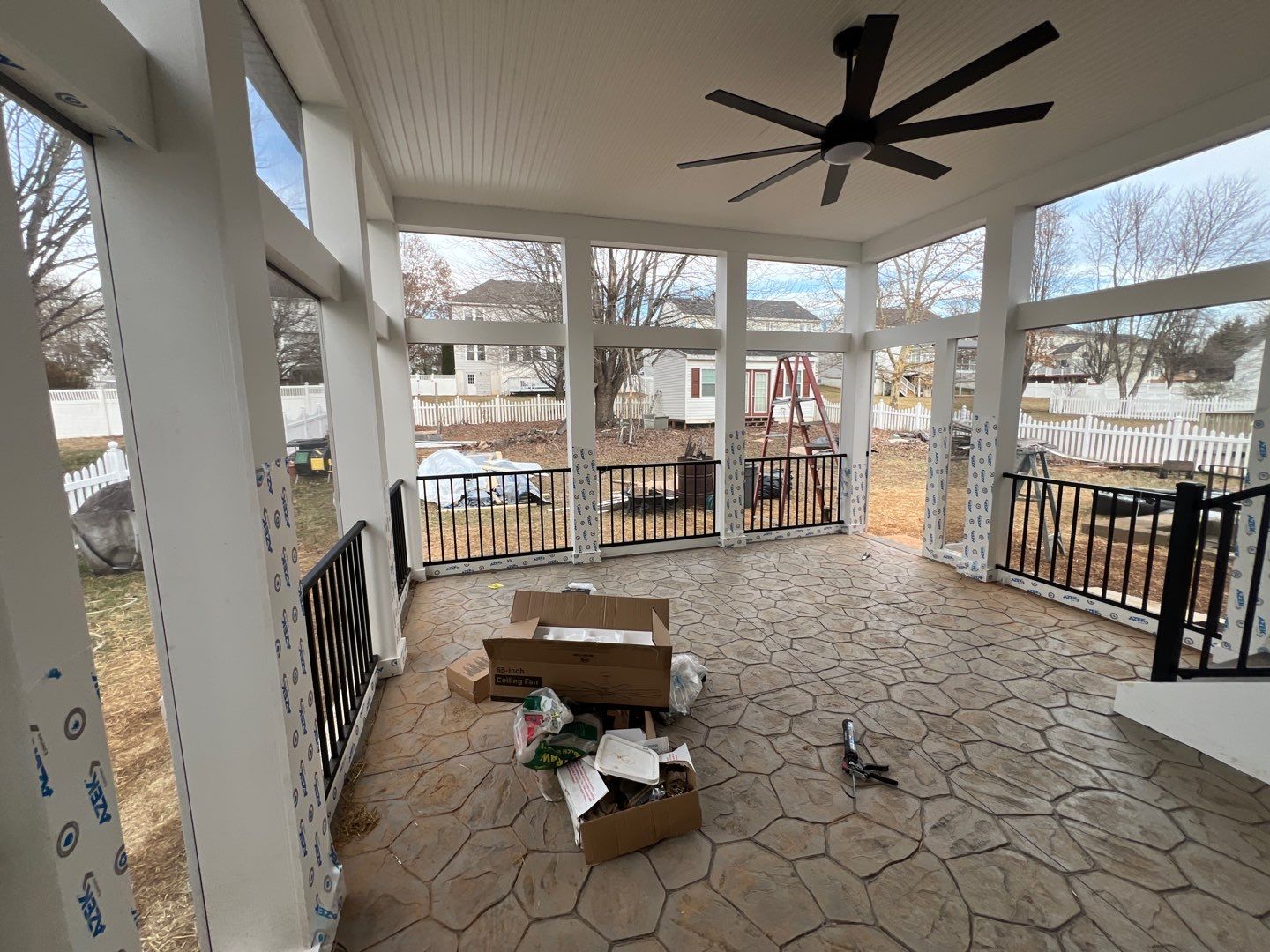 Custom Screened-In Porch with Stamped Concrete Patio in Warrenton by Jakari Restoration & Construction LLC