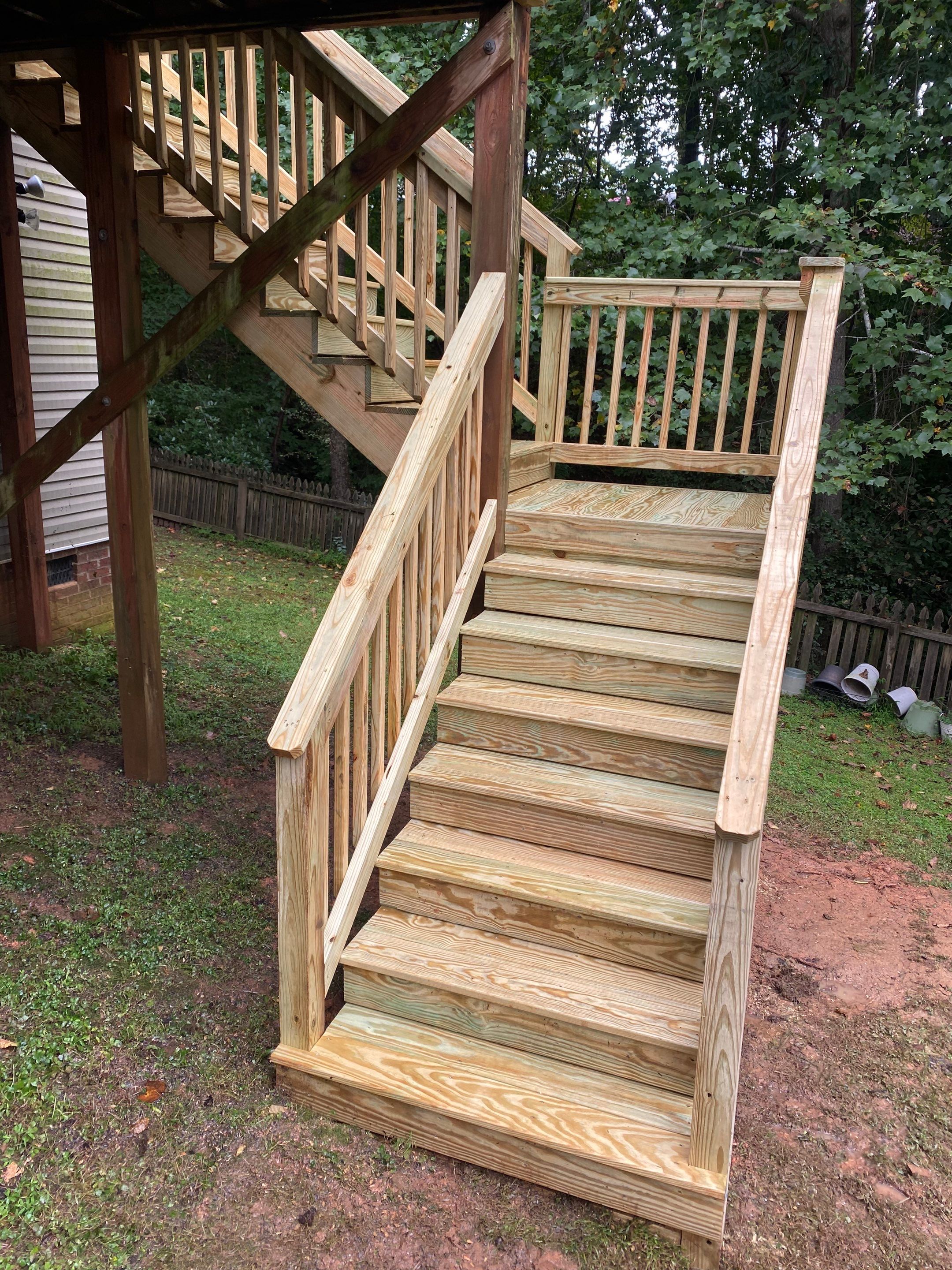 Pressure-Treated Deck Resurfacing and Stair Replacement in Wake Forest by The Remodeling Company
