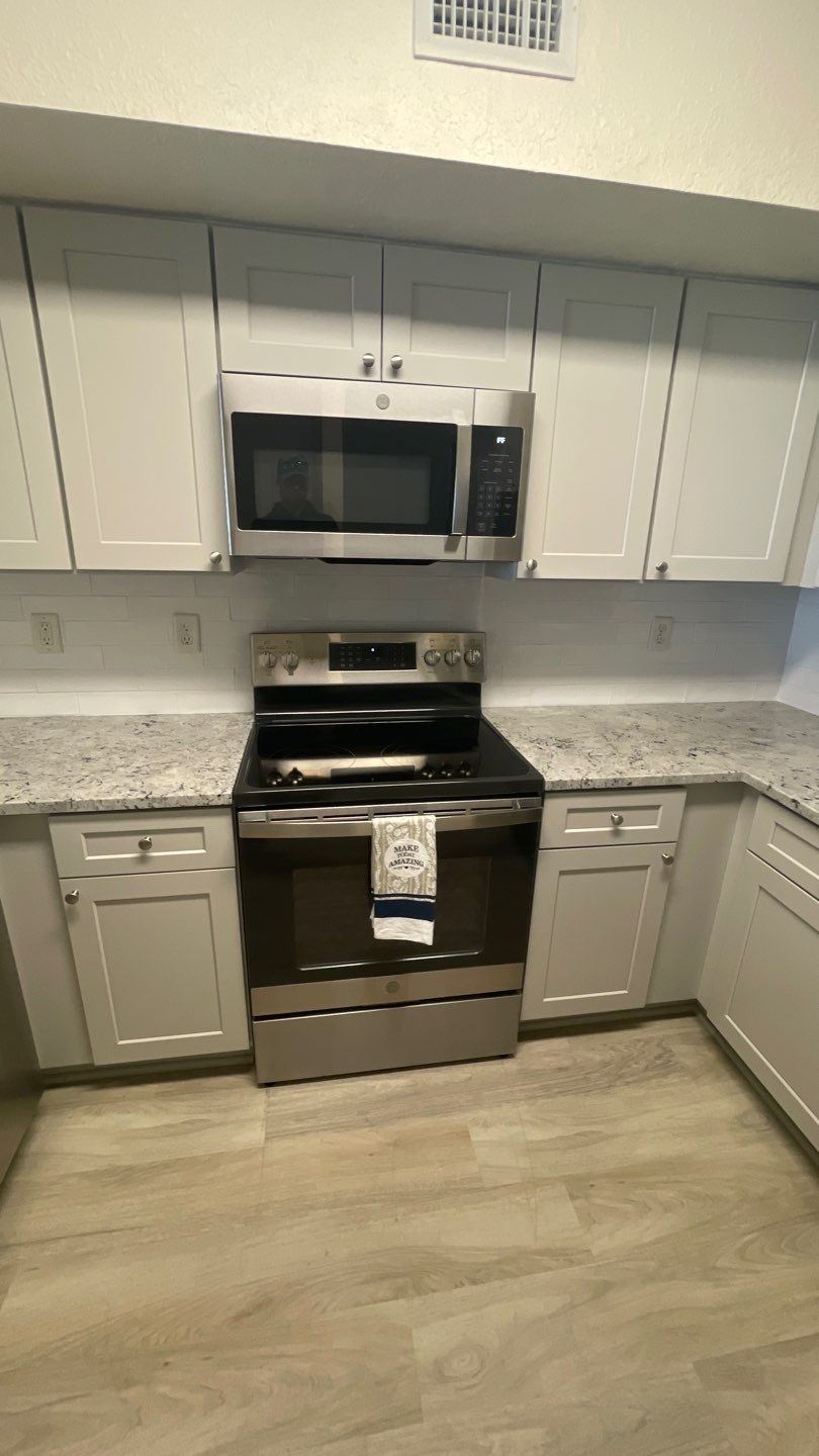 Home Remodel using LVP Flooring and Cabinets by HandyMangum