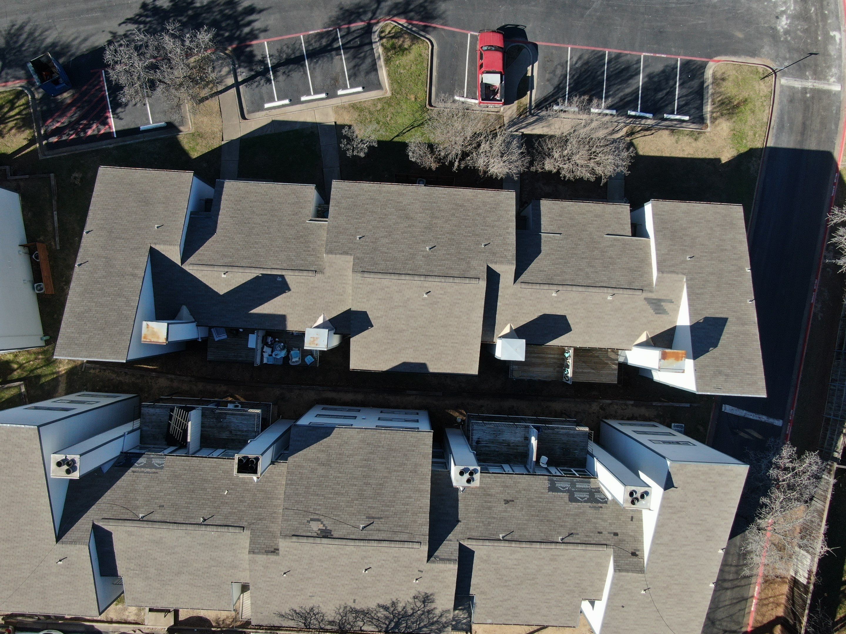 Apartment Roofing Repairs using Certainteed xt25 by Becker Roofing and Exteriors