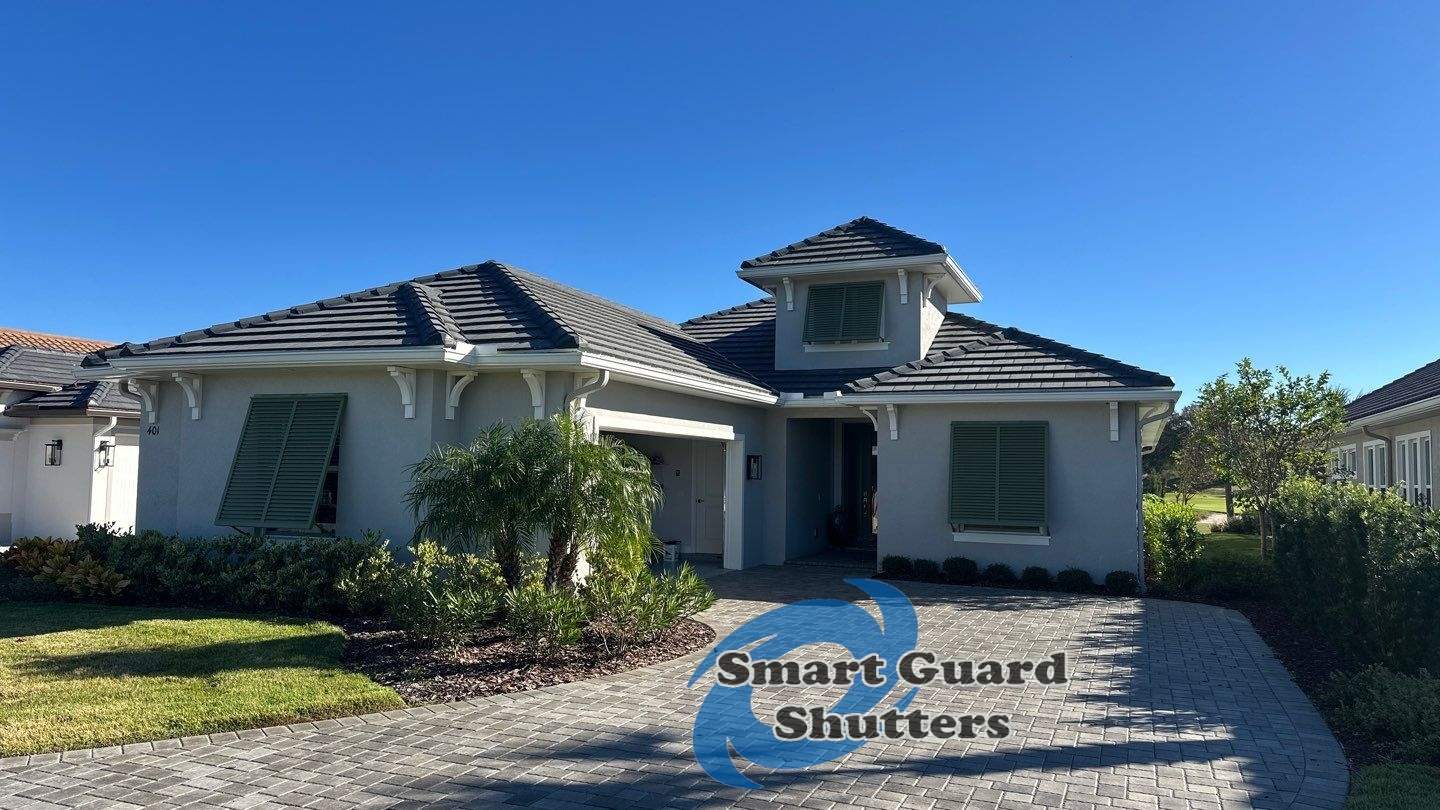 Decorative Bahamas in Reed Green by Smart Guard Shutters