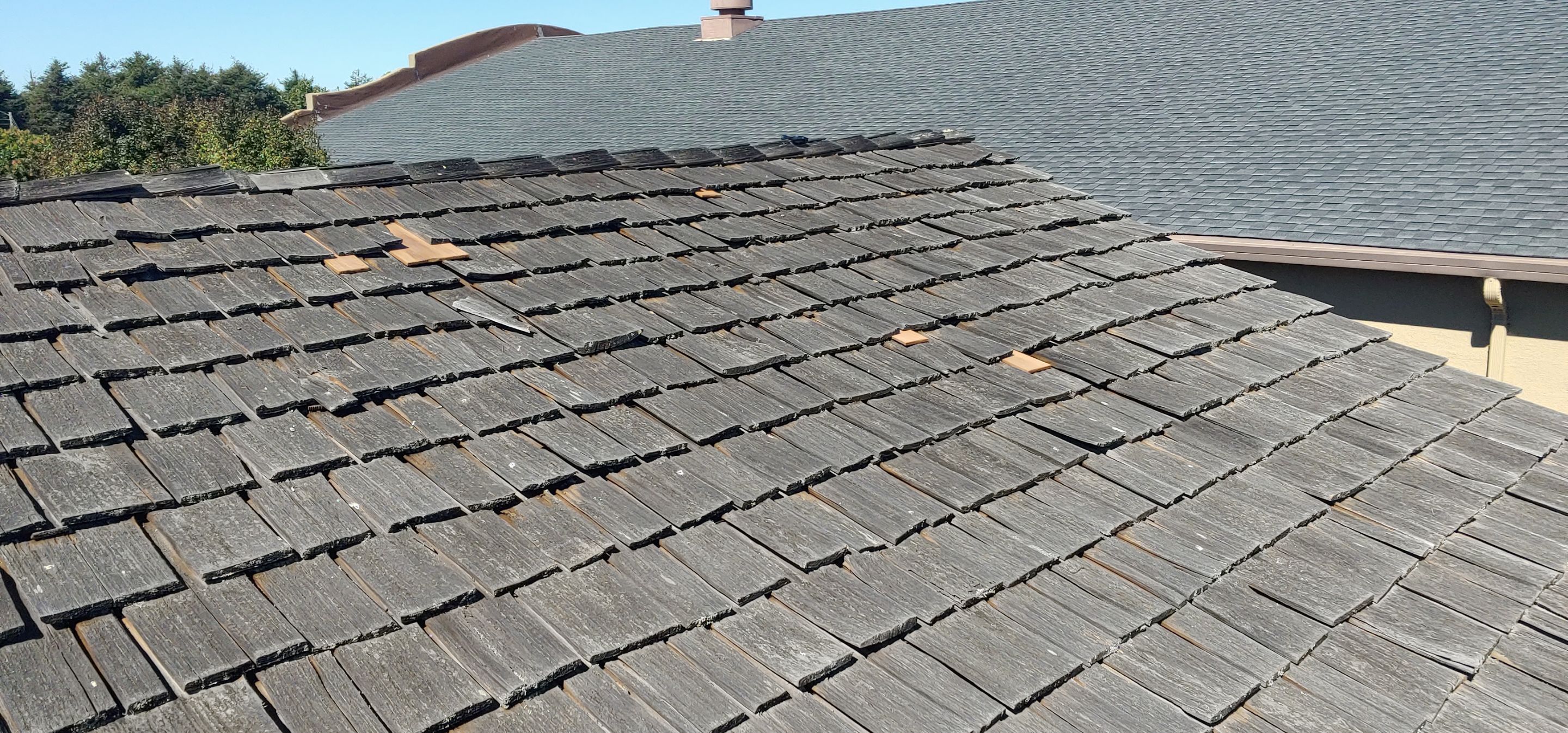 Refurbish and repair shake roof to get ready to sell by Straight Edge Roofing Inc