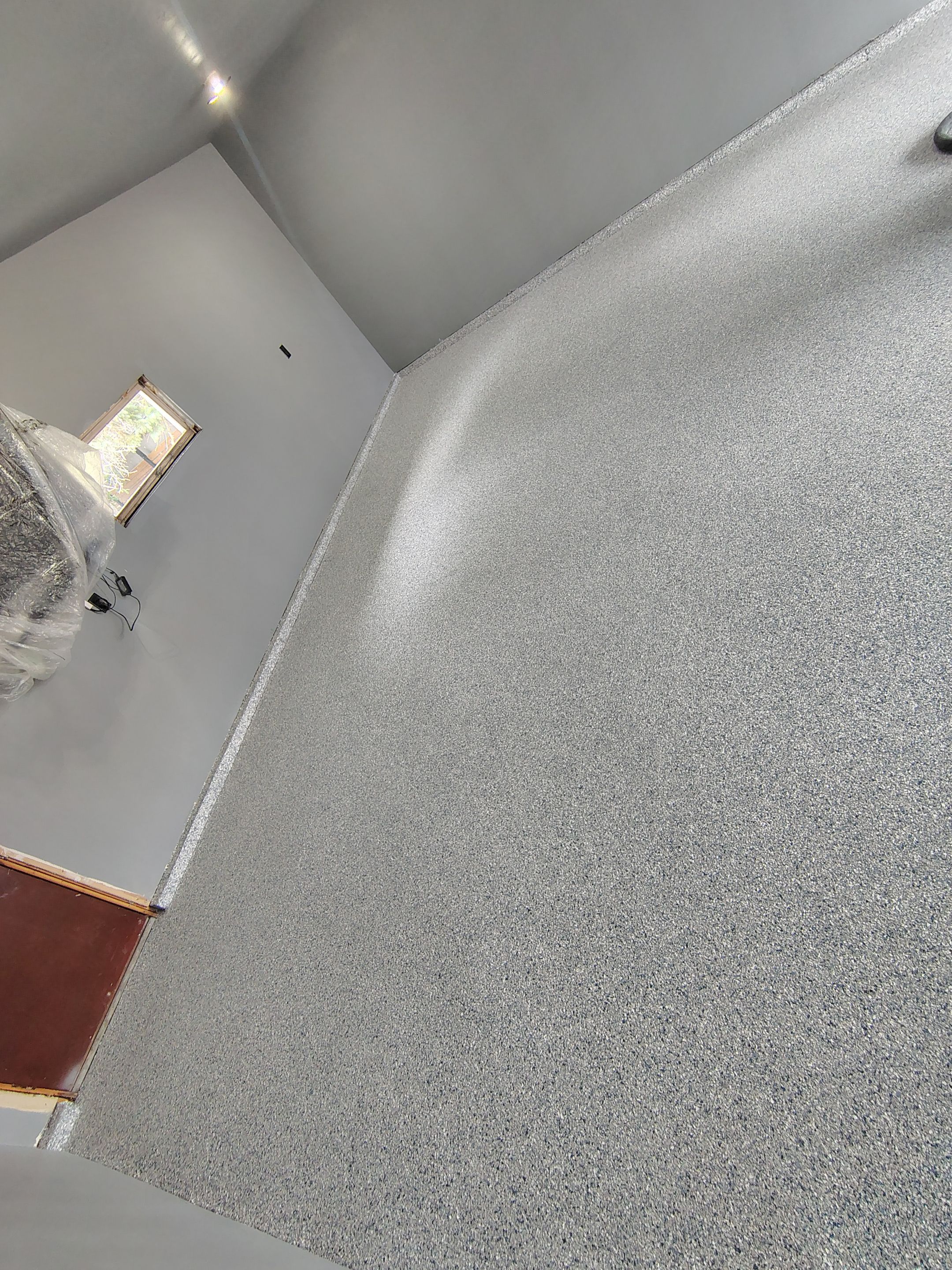 Garage Floor Concrete Coating and Surface Restoration in Colman by Select Painting, Coatings & Garage Cabinets
