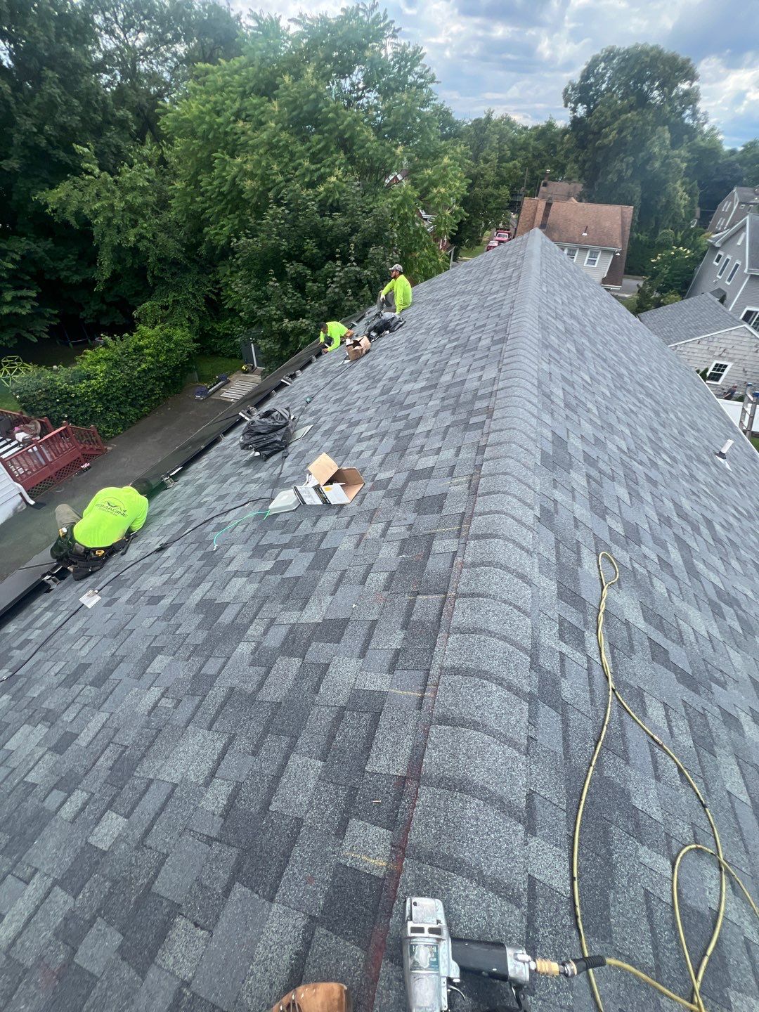 Charcoal Shingles by Reimagine Roofing