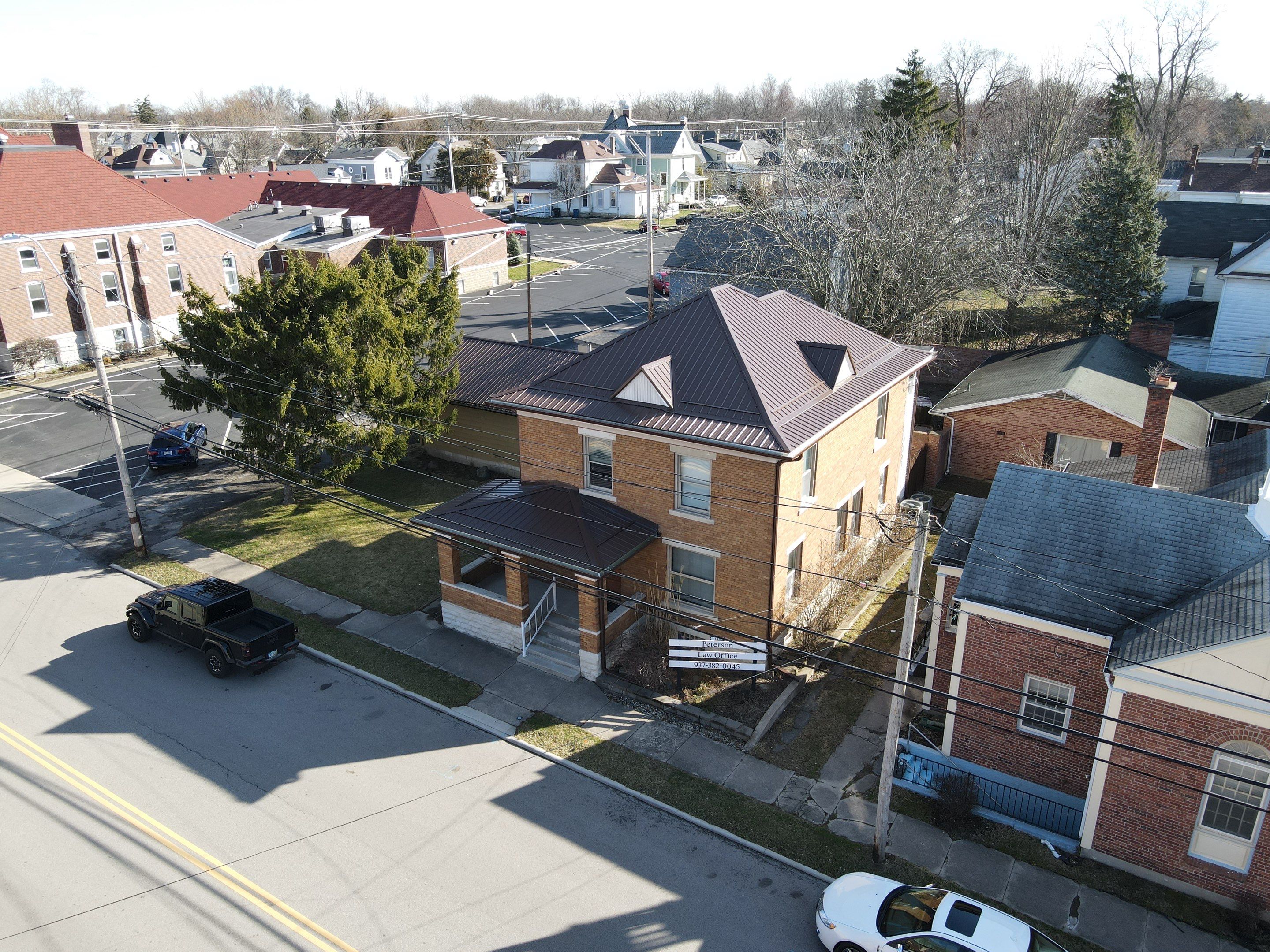 Residential Roofing Installation using Performance Panel Metal - Brown by RoofX