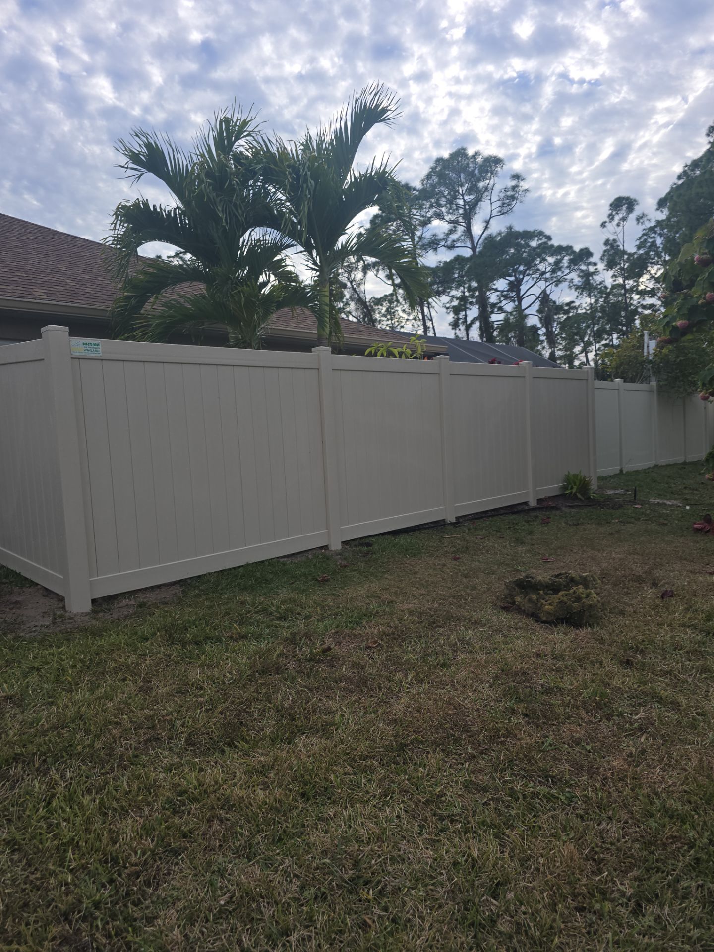 Tan Vinyl Fence in North Port by True Fence LLC