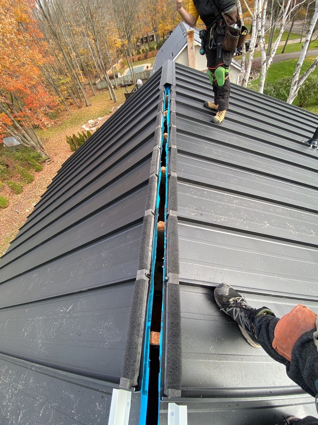 Residential Roofing Installation using 16" Standing Seam Panels by Jay Carter Roofing & Sheet Metal