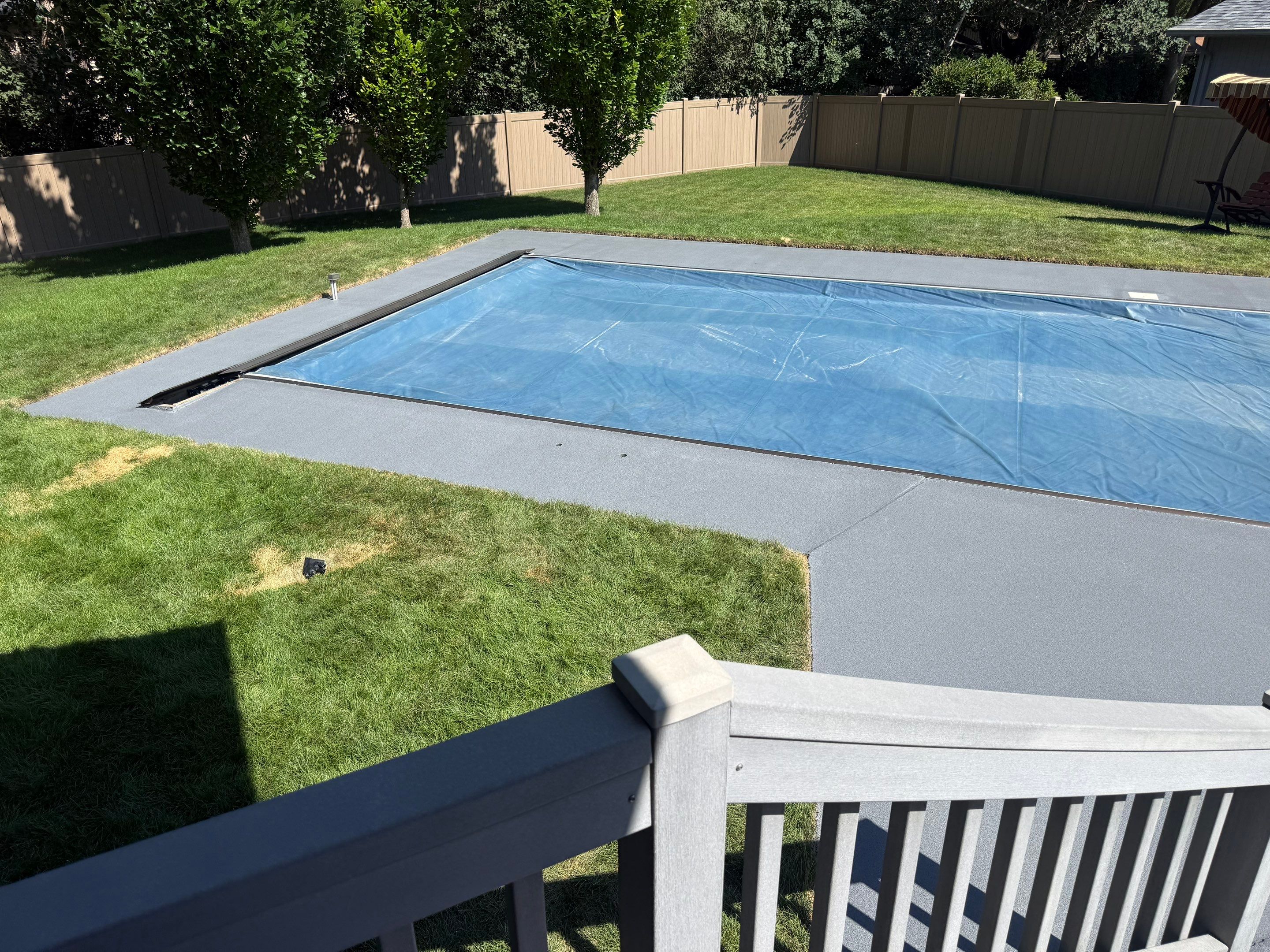 Residential Pool Deck Resurfacing in Sioux Falls by Select Painting, Coatings & Garage Cabinets