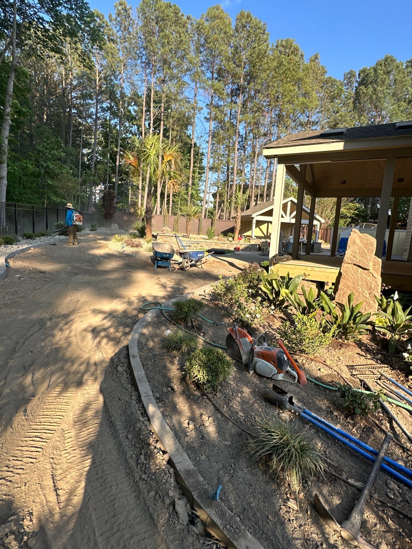 Backyard oasis in Cary by Martinez Brother’s Nc Landscaping Inc
