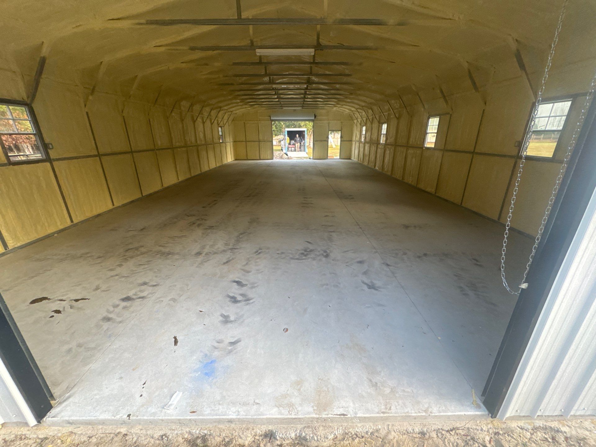 Metal Building/Kennel in Williston, FL in Smoke by Cross Creek Concrete Coatings