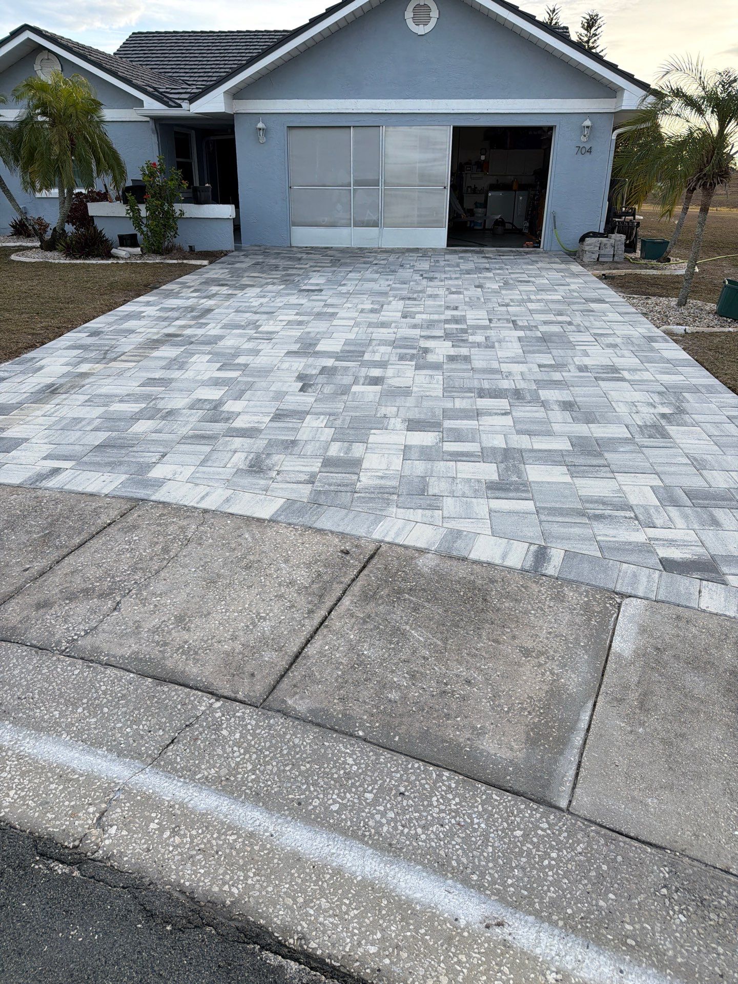 Multi-Tone Gray Paver Driveway Sealing in Sun City Center by Supreme Paver Experts