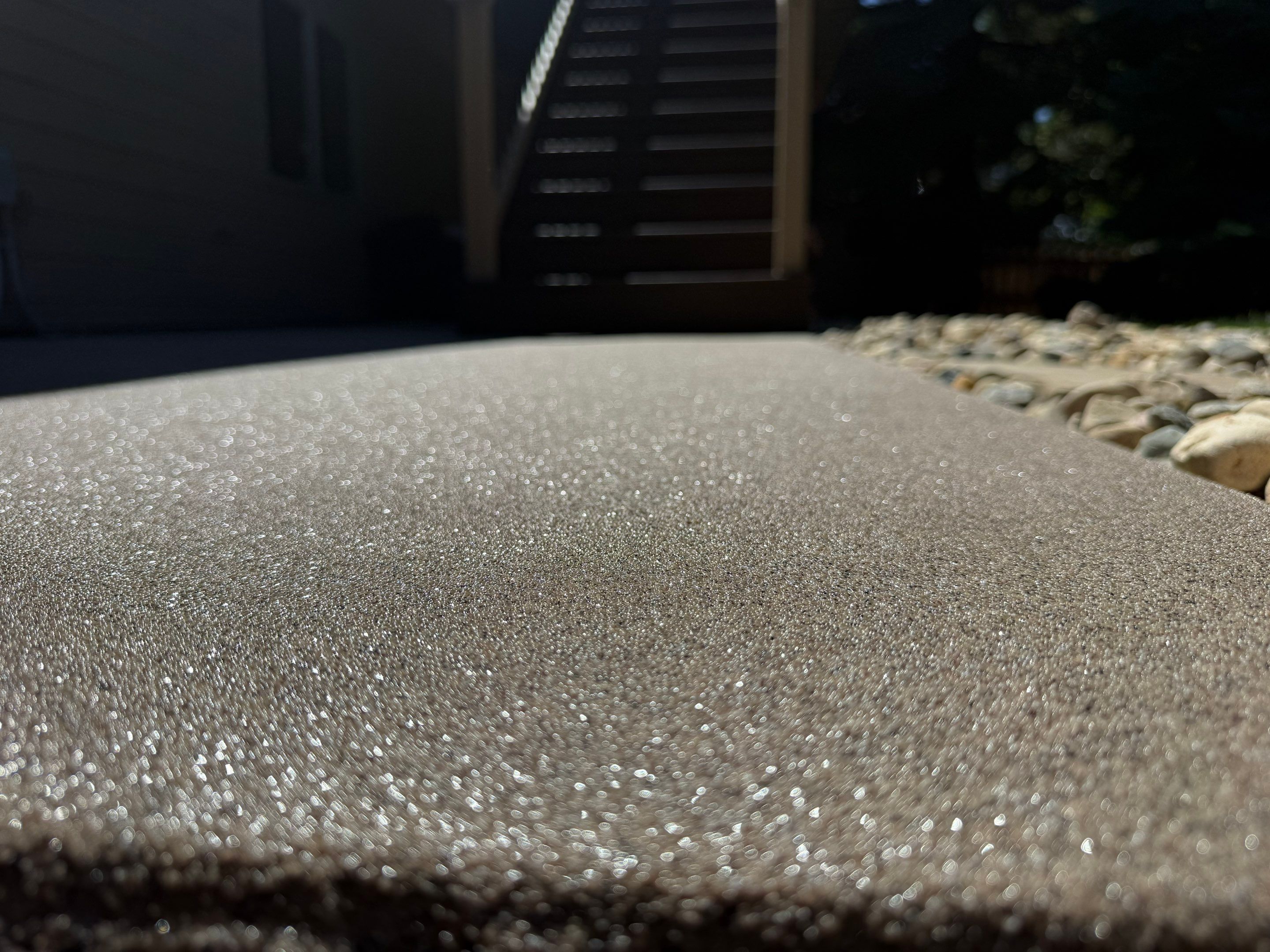 Textured Concrete Coating and Paver Patio Refresh in Sioux Falls by Select Painting, Coatings & Garage Cabinets
