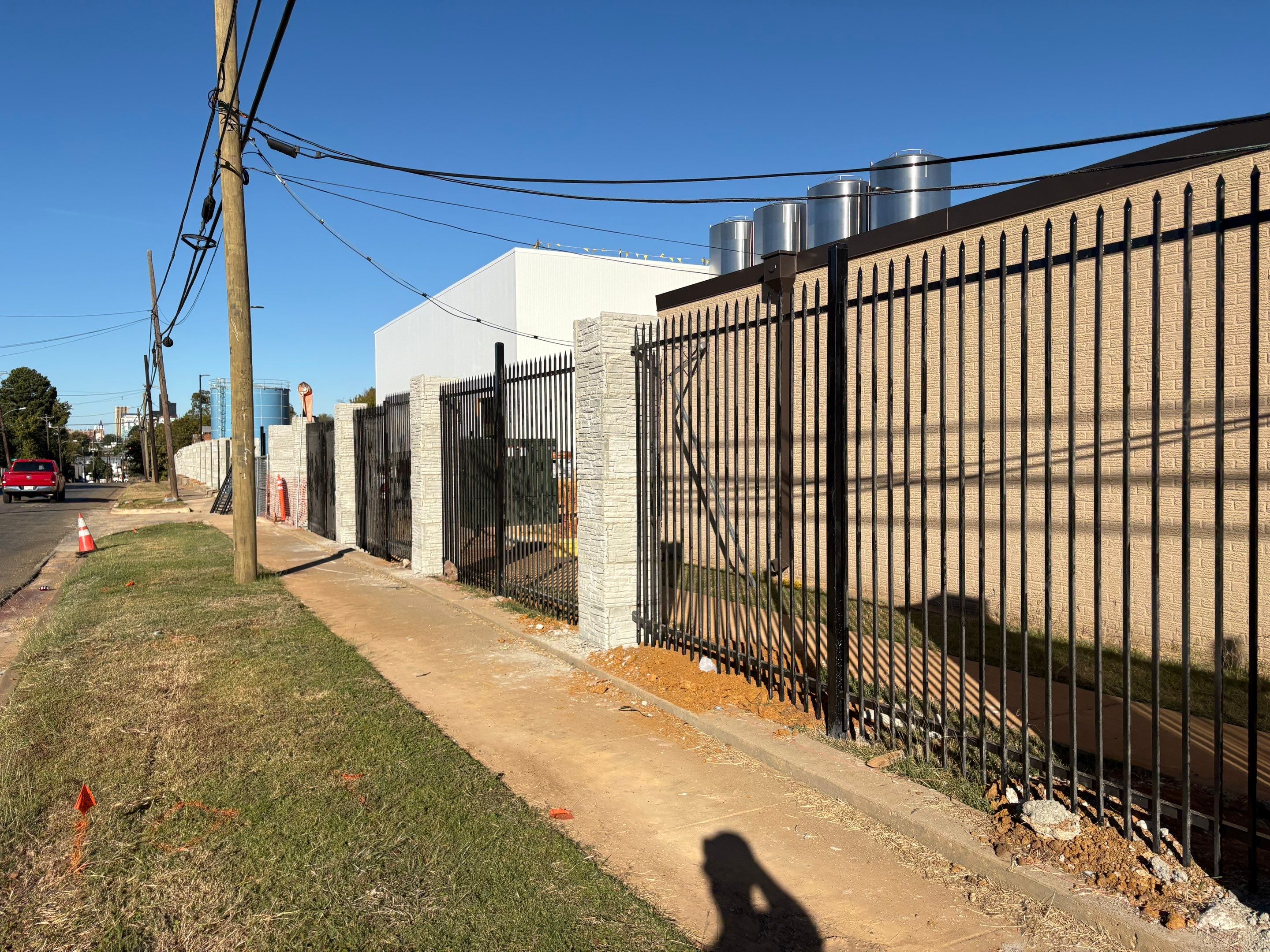 Commercial Fencing - Wrought Iron with Concrete columns by 3:16 Roofing and Construction