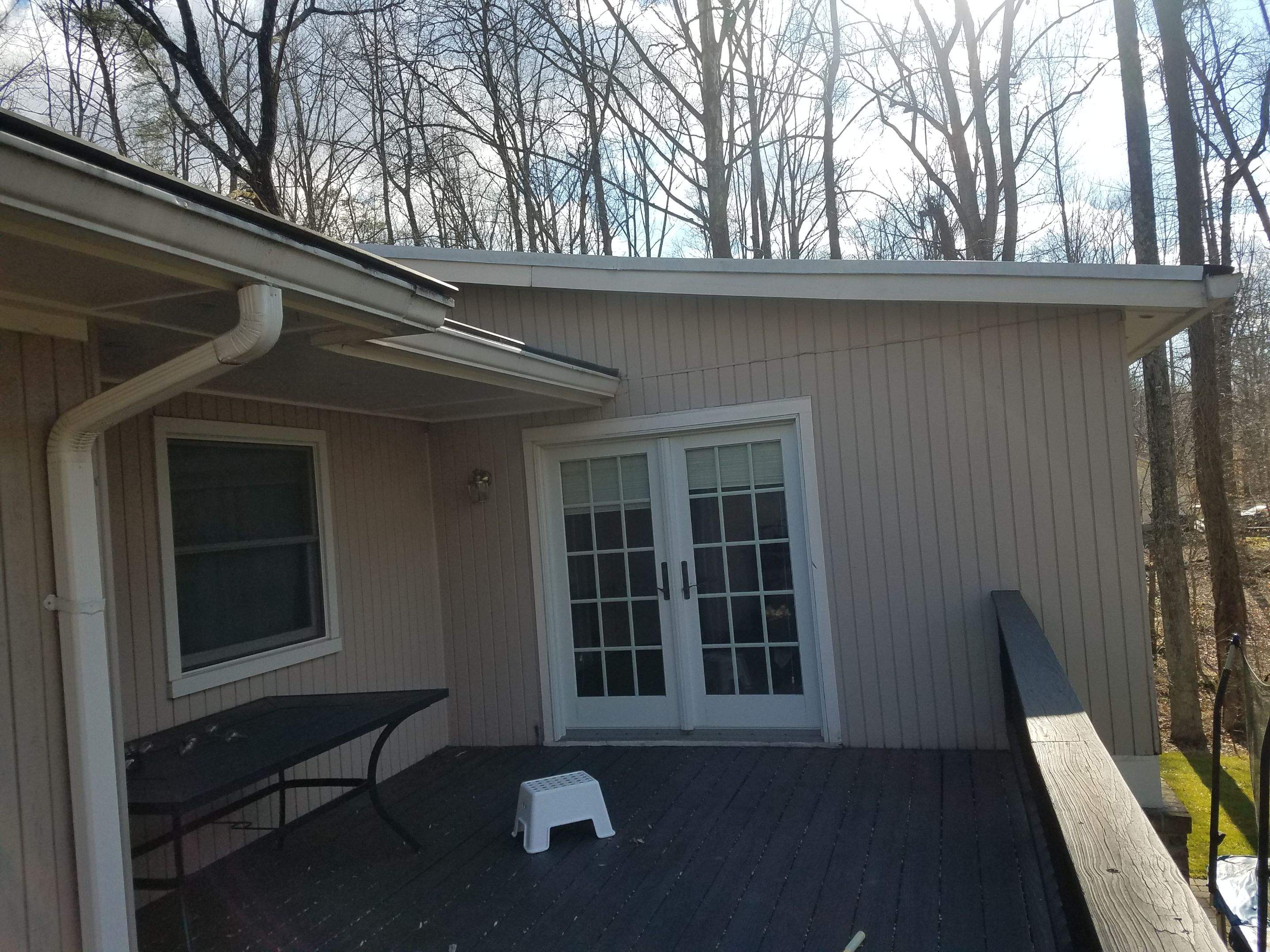 Roof, Siding, Door, and gutter replacement by American Home Contractors