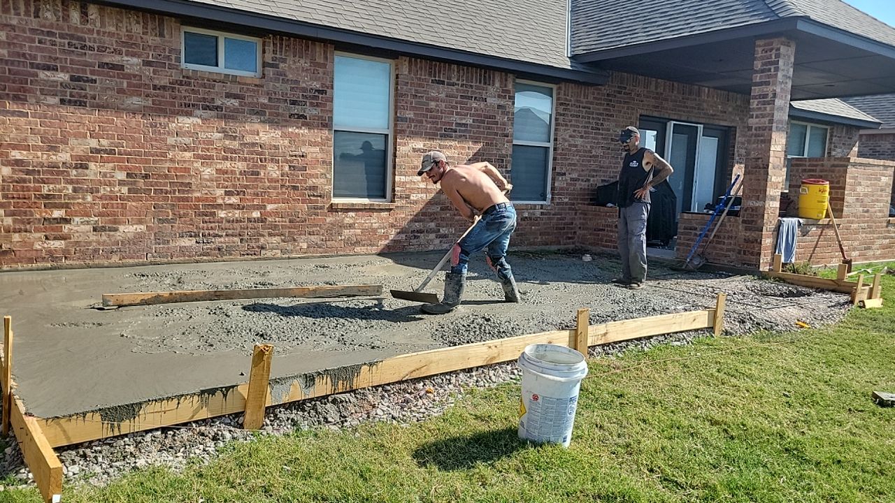 Concrete slab with Pergola by Clays Services Inc
