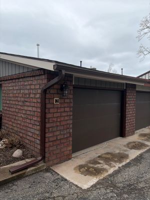 Gutter and Downspout Installation for Petoskey Residential Brick Exterior