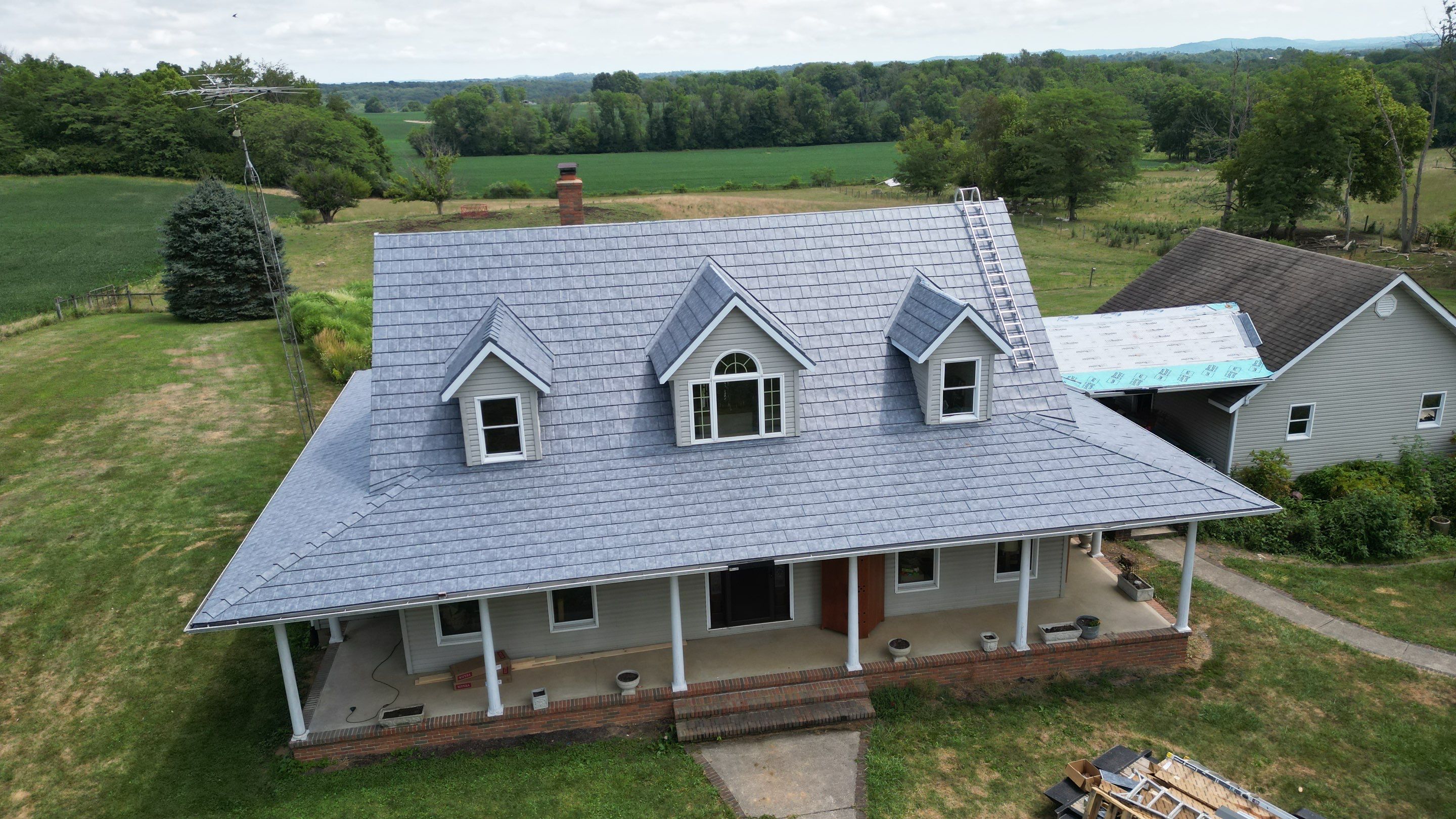 Residential Roofing Installation using ProVia Ironstone Slate Metal Roofing by RoofX 