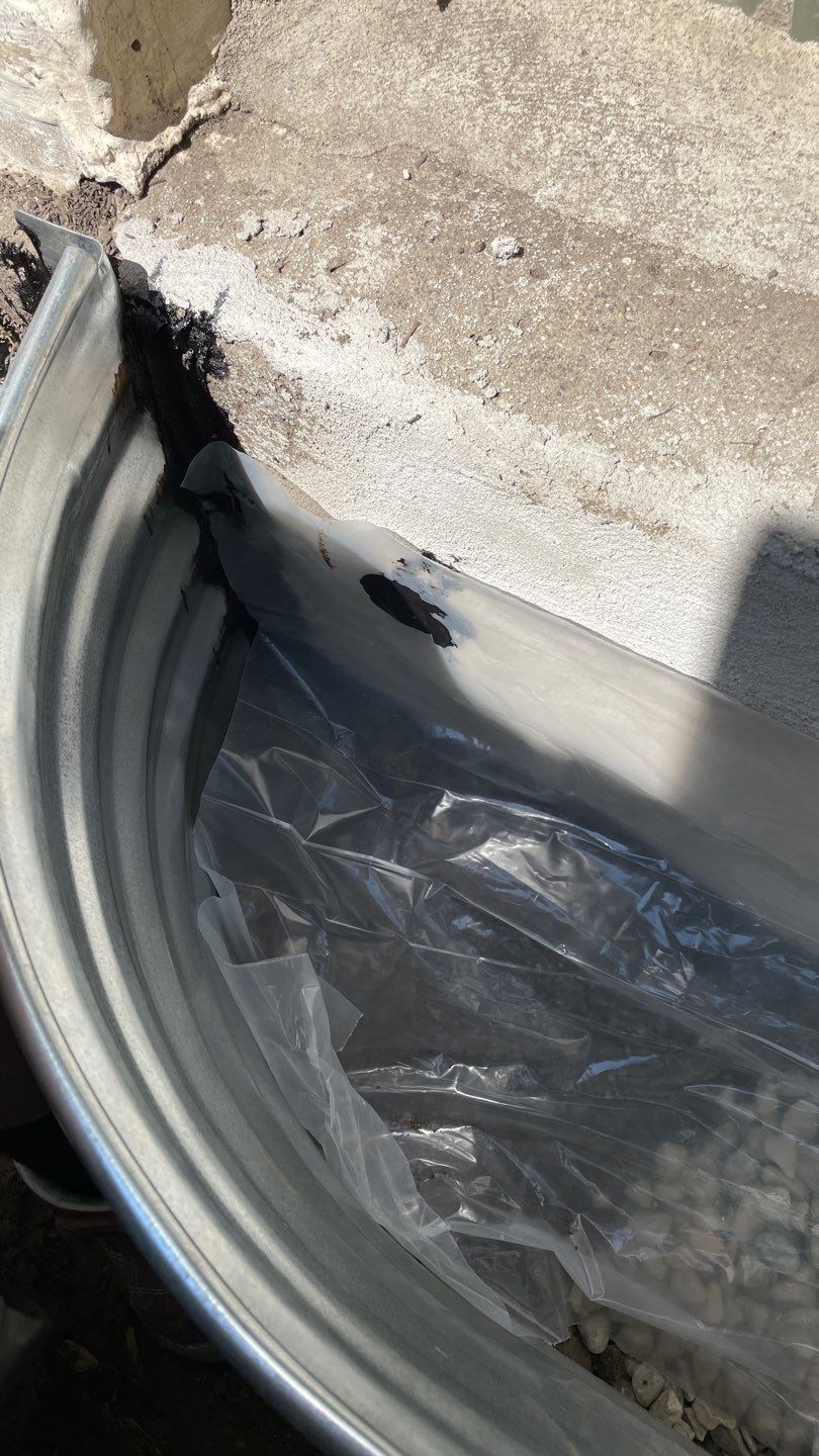 Drain Tile, Window Wells & Buried Discharge in Minneapolis by Waterproofing Northeast